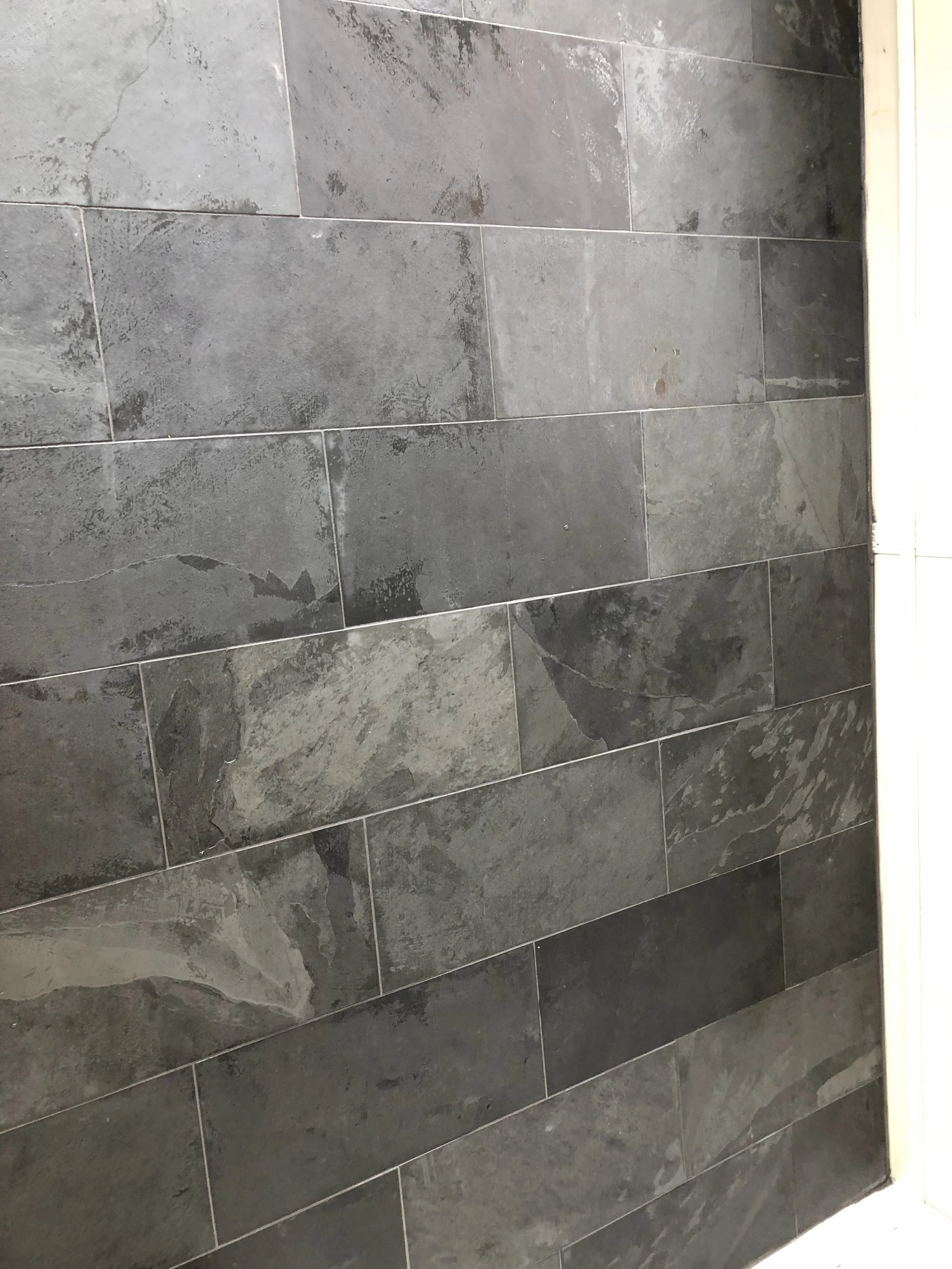Gray stone tile wall.