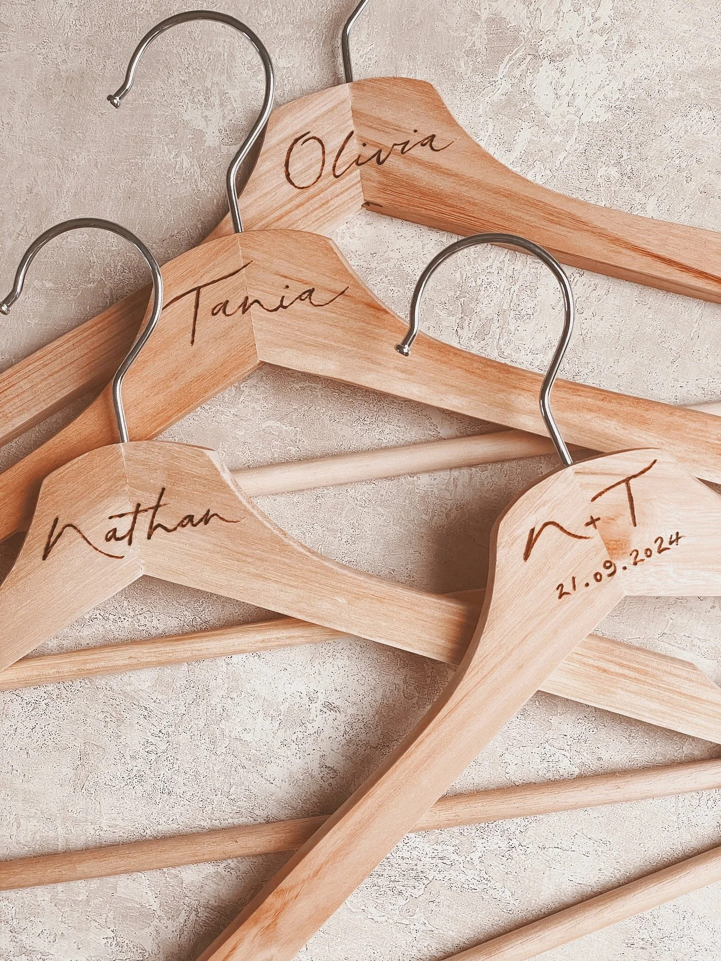 A small detail that&rsquo;ll 𝘩𝘢𝘯𝘨 around forever 🤍

Sorry, couldn&rsquo;t resist the pun! But, to remind our bridal party of our big day (and their names of course), I created these practical personalised wedding hangers.

Such a lovely touch fo