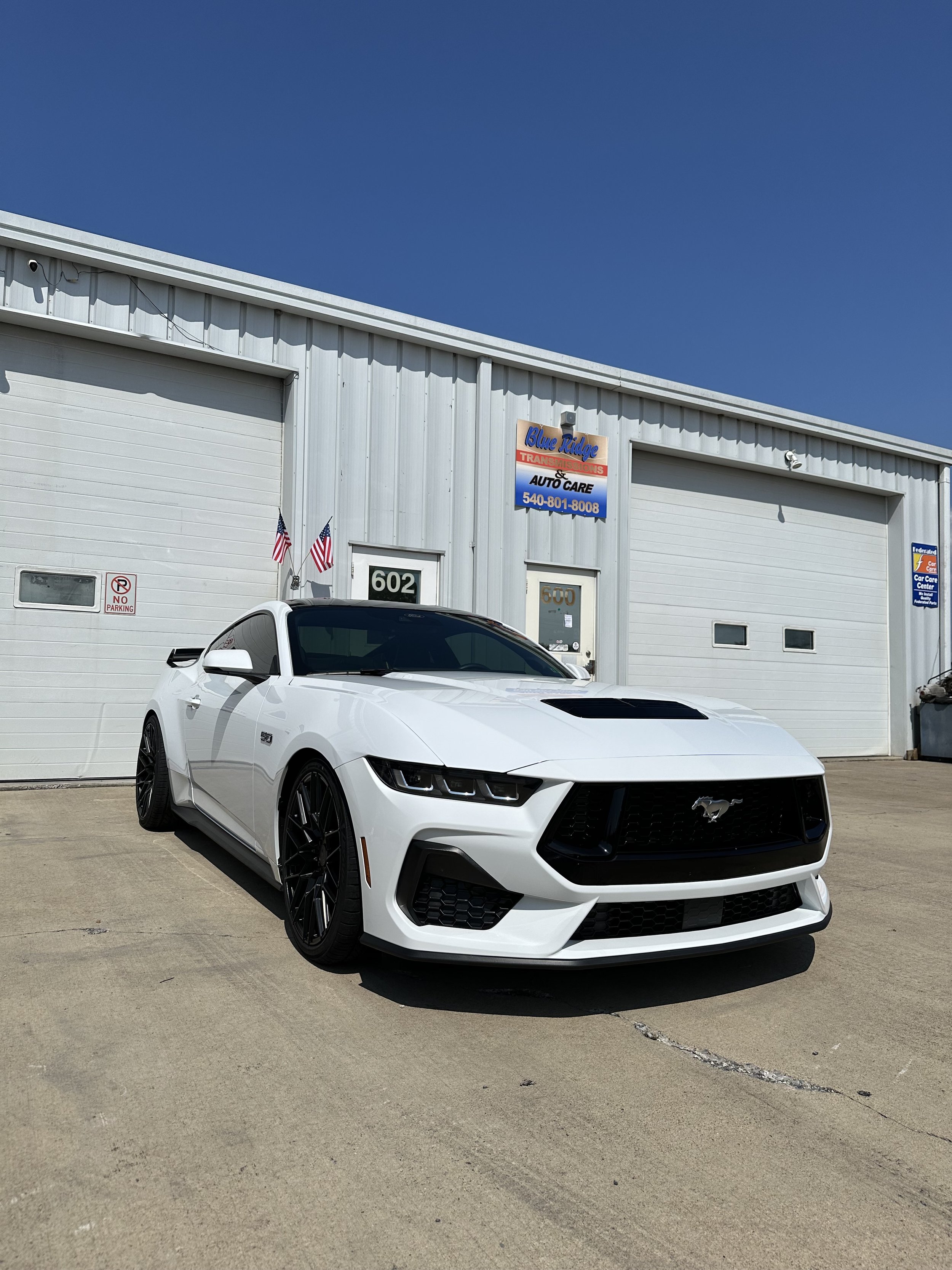 s650 Mustang front end ppf, gloss black ppf roof and lowering springs installed.