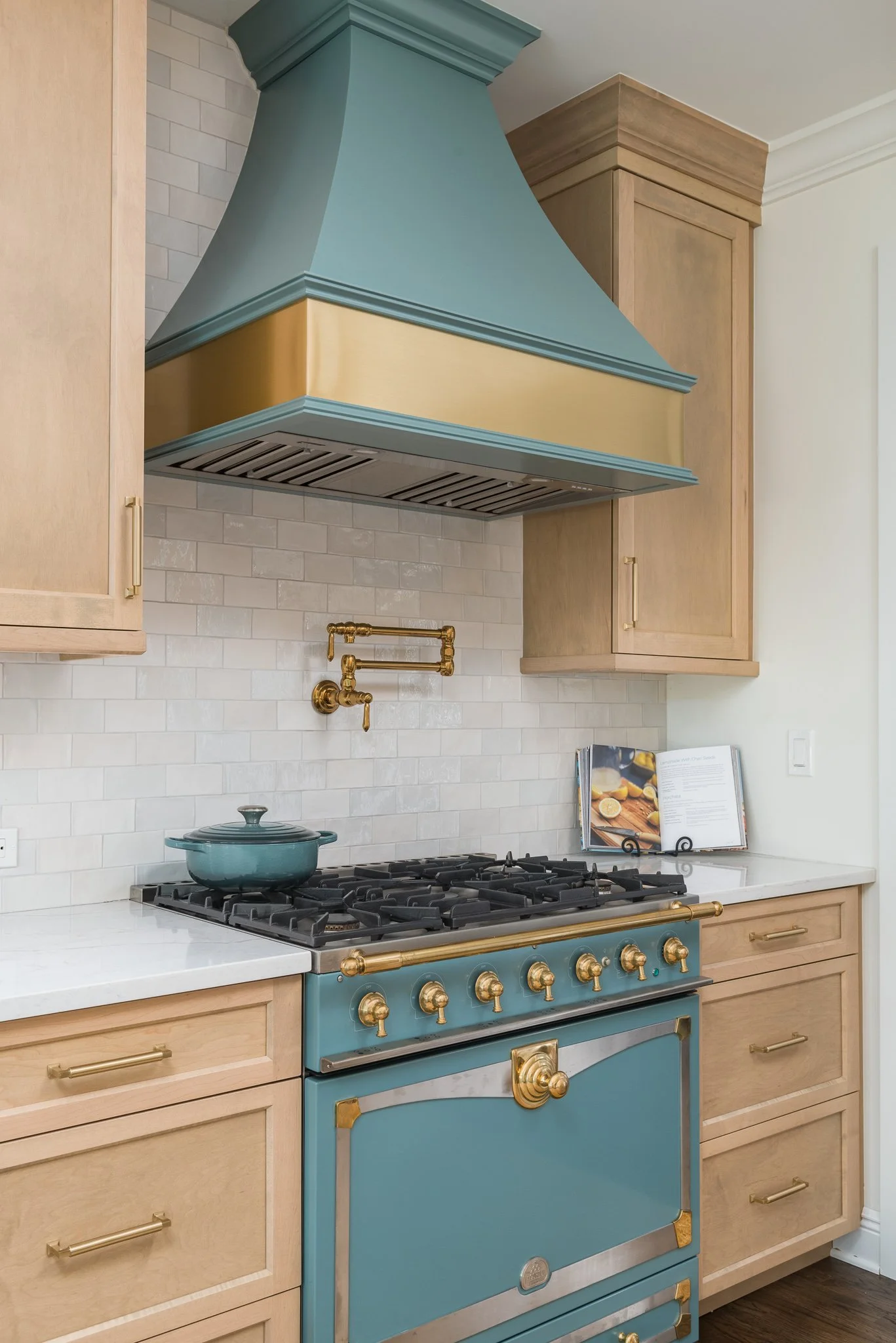 a great photo of a Painted Range Hoods With a Metal Band and a matching stove