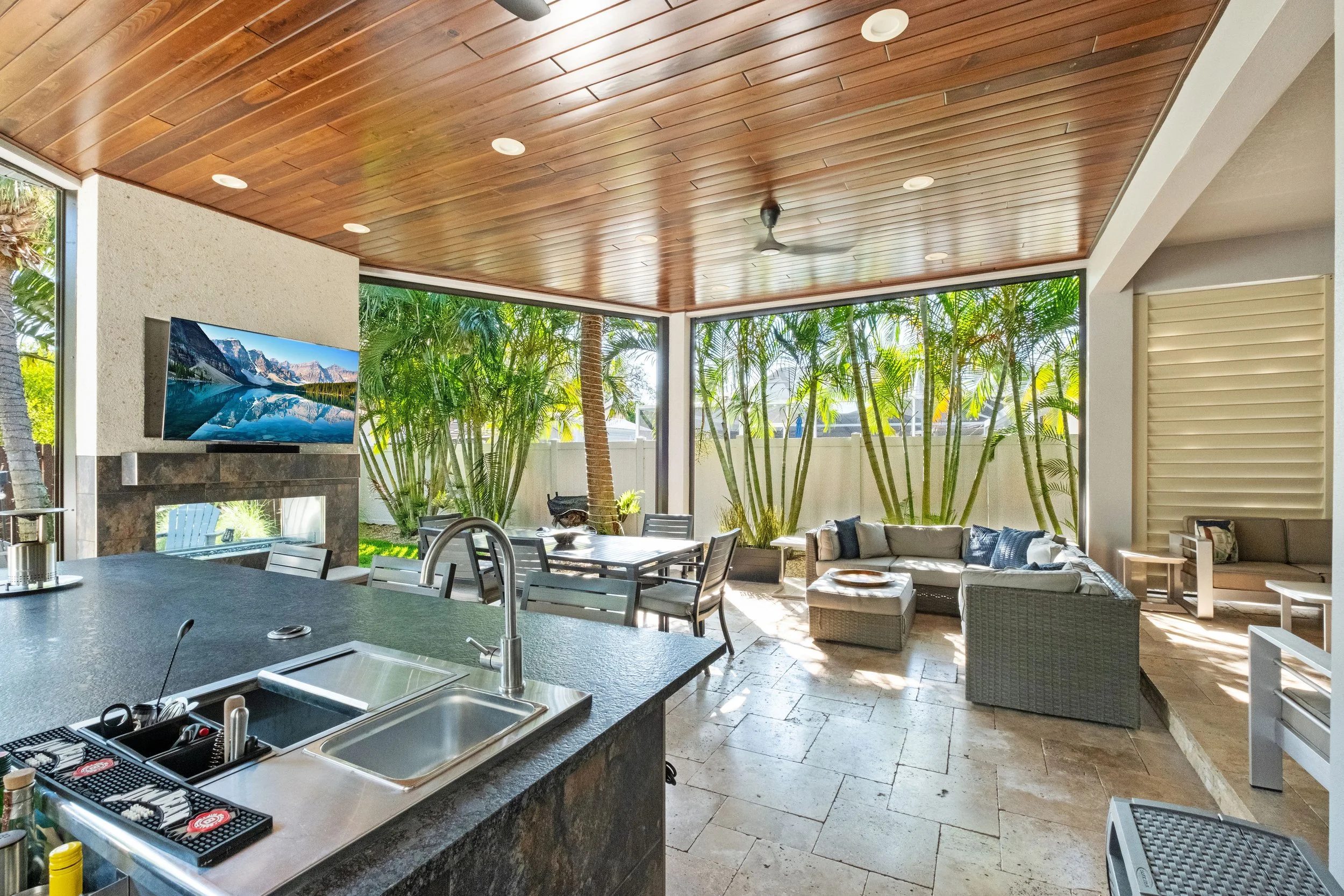 a photo of a Backyard Covered Patio with a custom kitchen | lindross remodeling south tempa