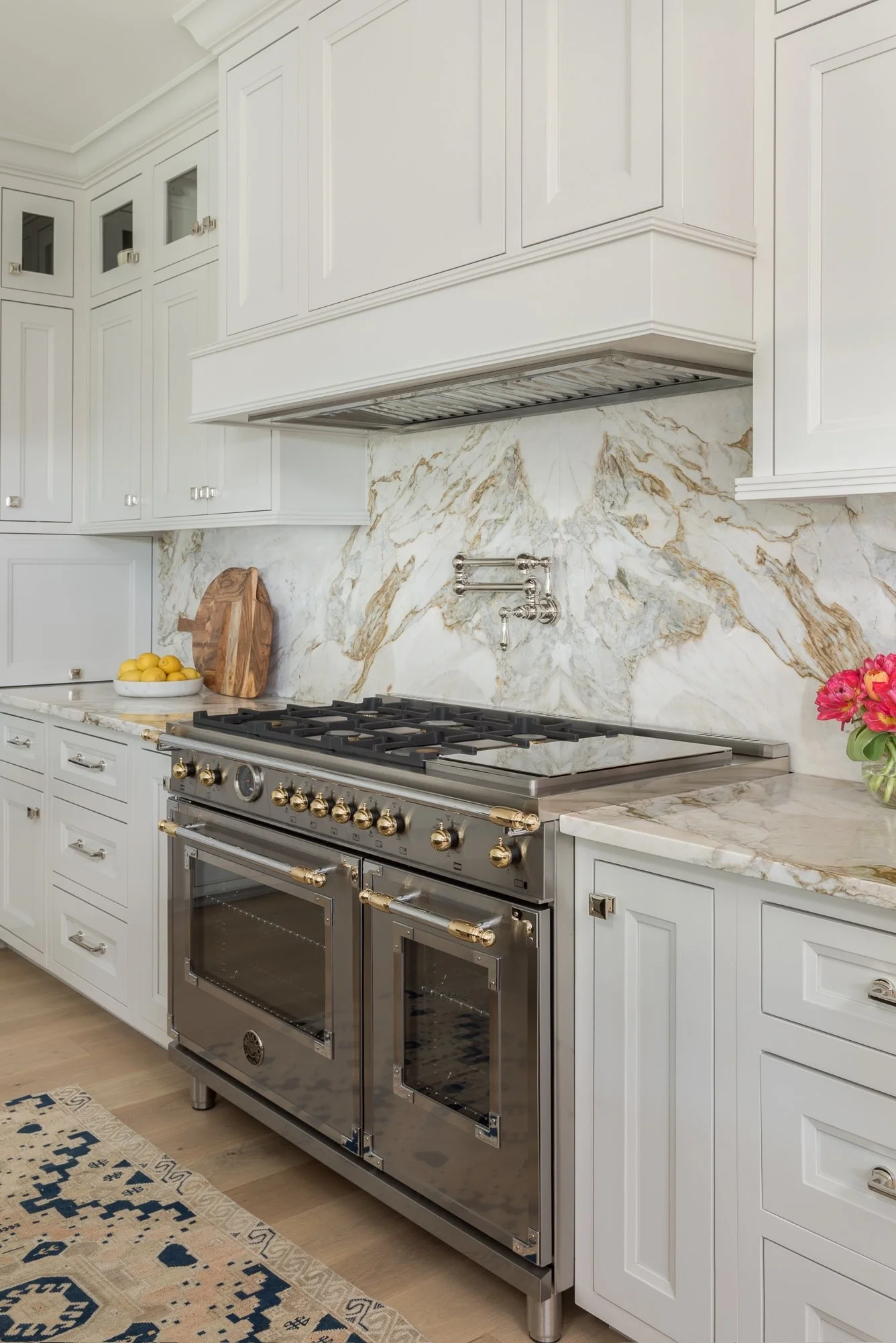 Range Hood Insert that blends right into the cabinetry in a custom kitchen by Lindross Remodeling