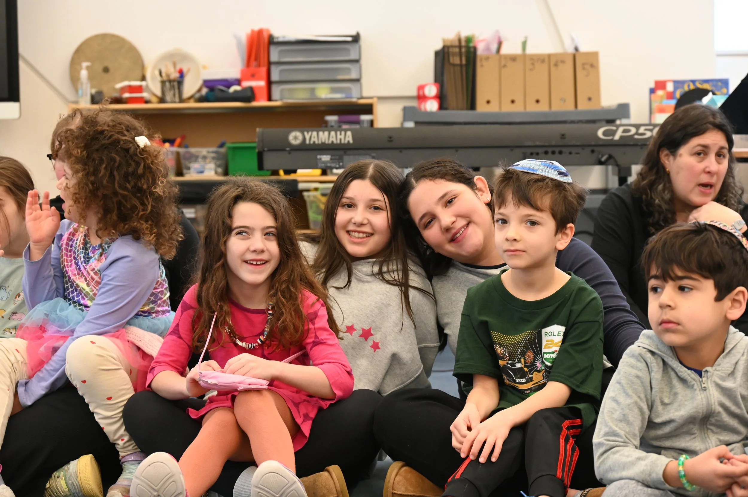Kindergarten and Grade 7 Buddies Meet For Tefillah