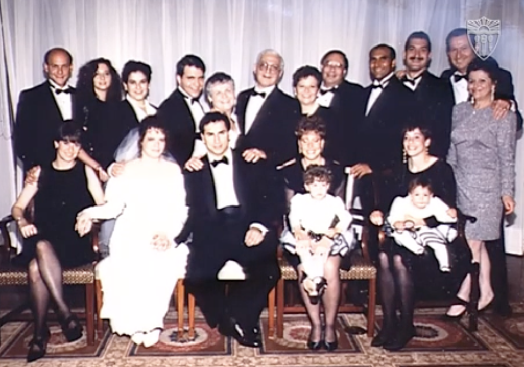 Sally and Kenneth Frishberg (rear center) at the wedding of their daughter, Leslie, to Louis Wolfowitz (front, second and third from left). Also pictured with them are their son, Jack, and his wife, Leslie (rear, second and third from left), Sally’s