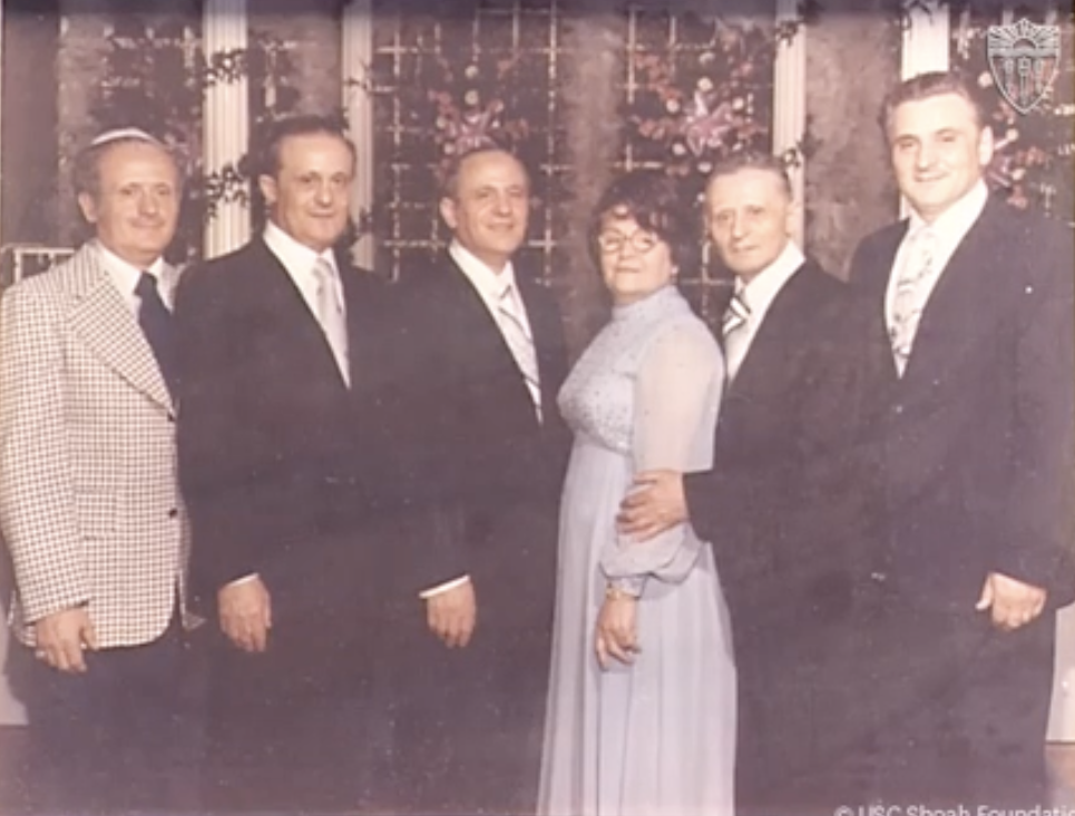  Sally’s mother, Celia, with brothers (left to right) Ben Zion, Avraham Chaim, Mordechai, Yitzhak, and Nahum Gamss, at a family bar mitzvah in Brooklyn, New York, circa 1970 