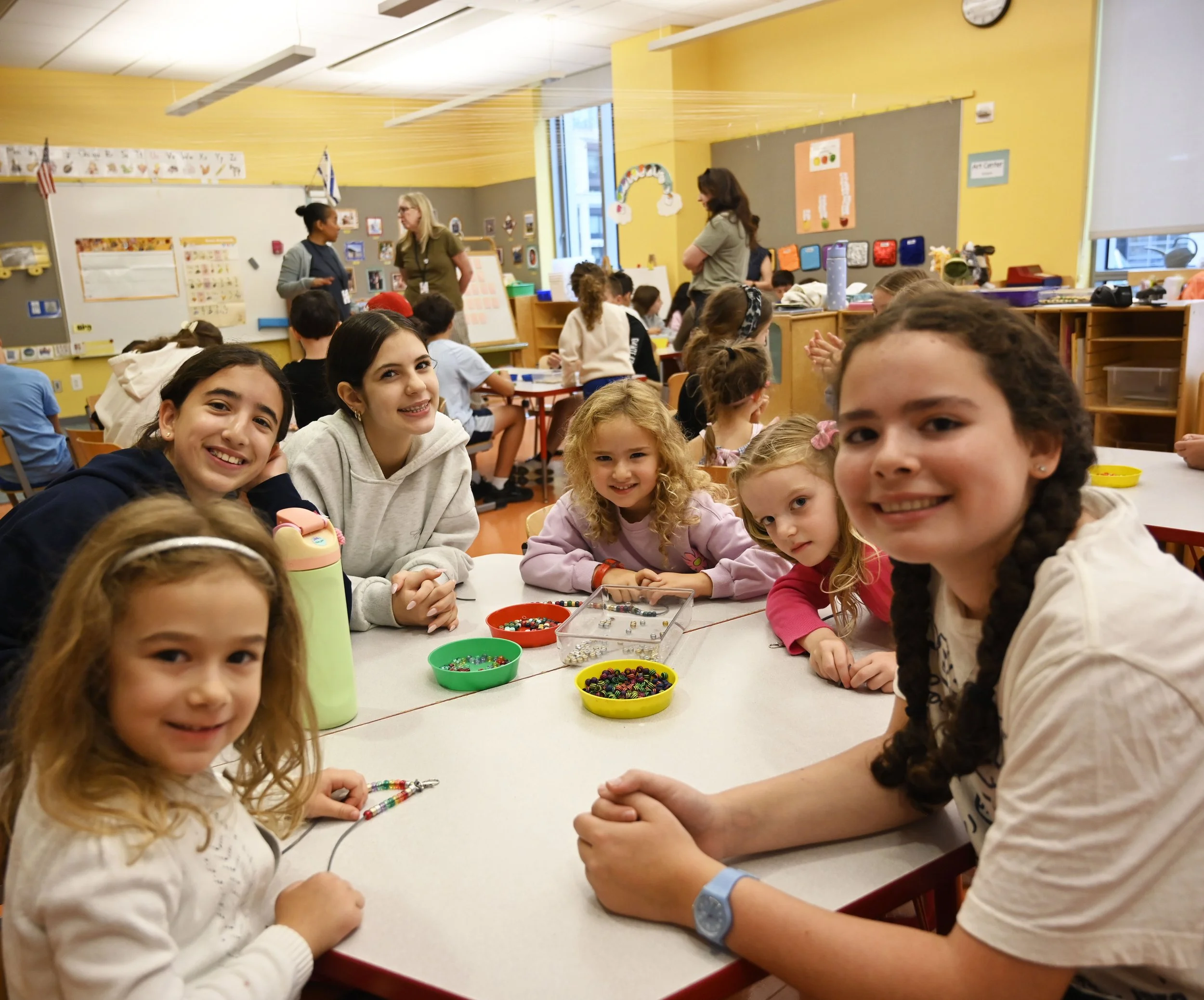 Kindergarten and Seventh Grade Buddies Create Friendship Bracelets