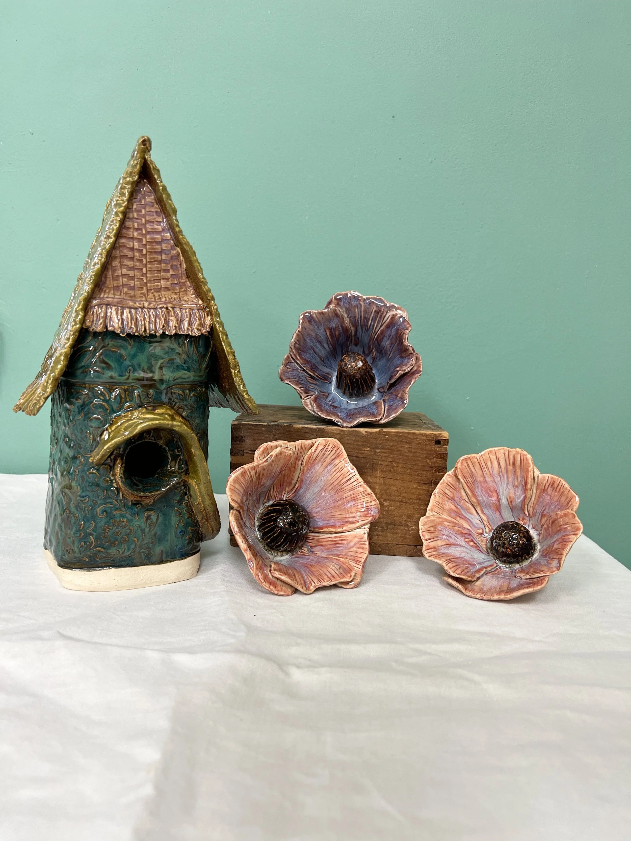 birdhouse and flowers.jpeg
