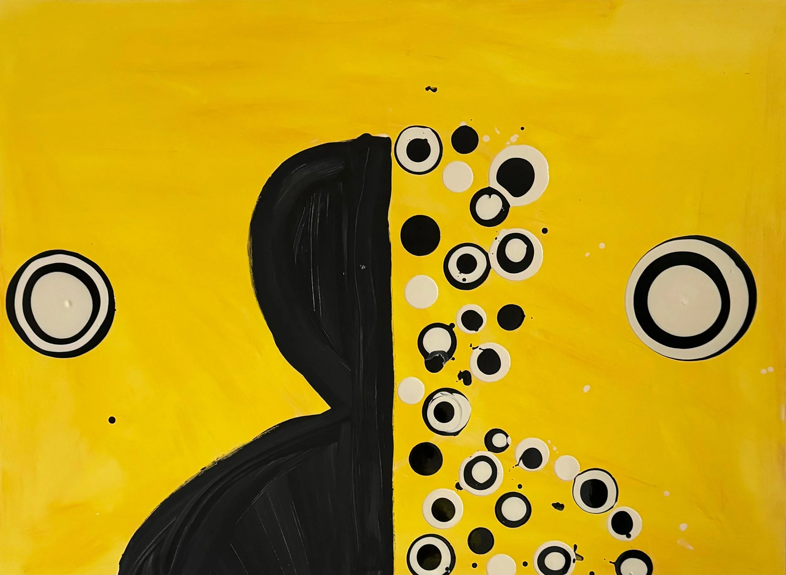Close-up of a yellow background with a black silhouette of a person’s head and hand, adorned with scattered black and white circular patterns.