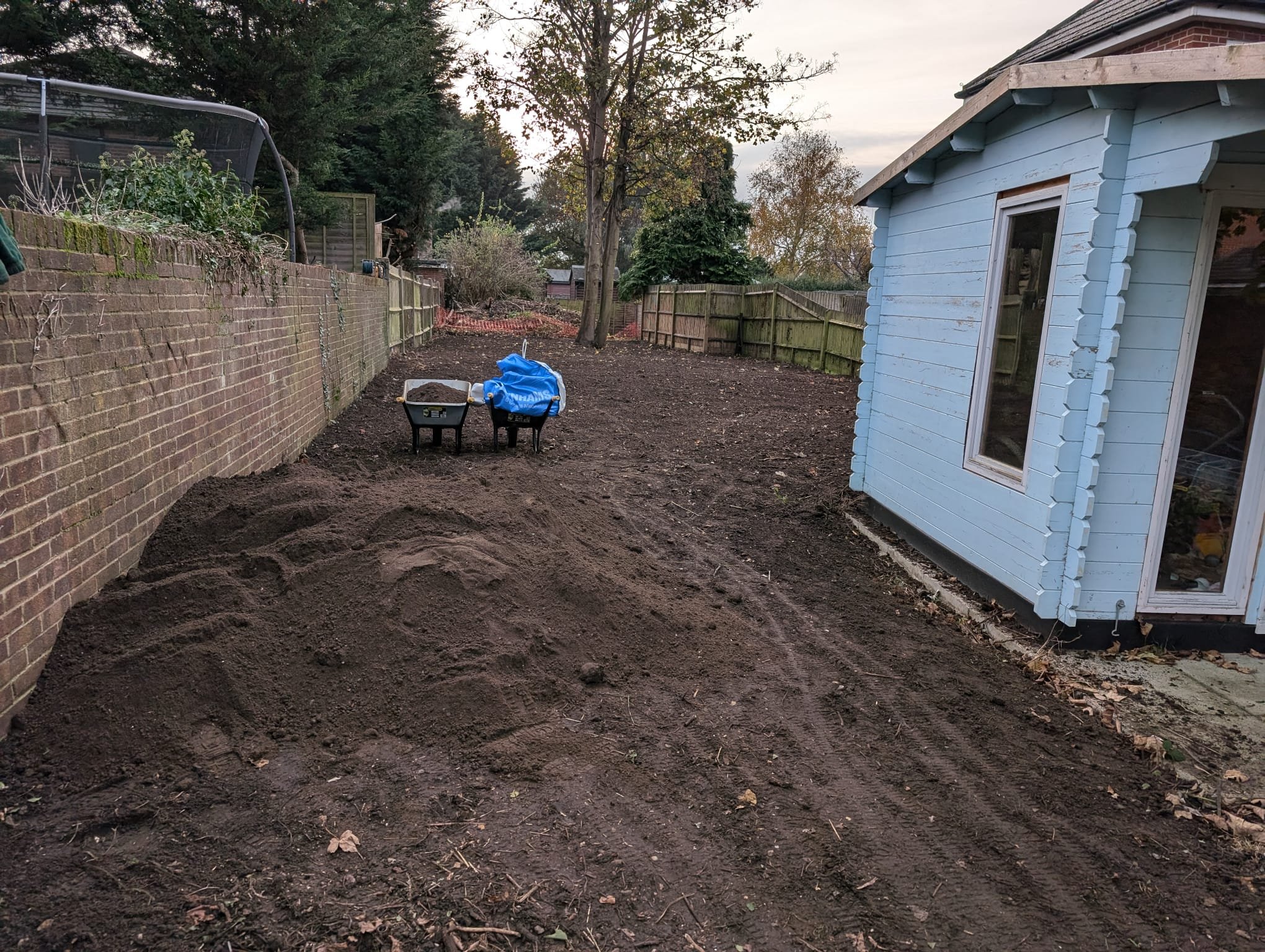 With all the debris cleared, the garden took on a whole new look. Smooth and fully cleared, the area was finally ready for some new life – a true blank canvas, just waiting for the next steps.