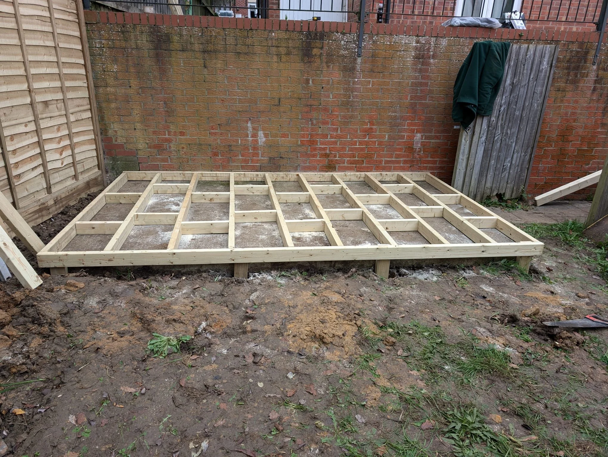 From there, we began building the framework for the new decking on top of the shed base. This stage is all about precision and preparation, ensuring the structure is solid and built to last.