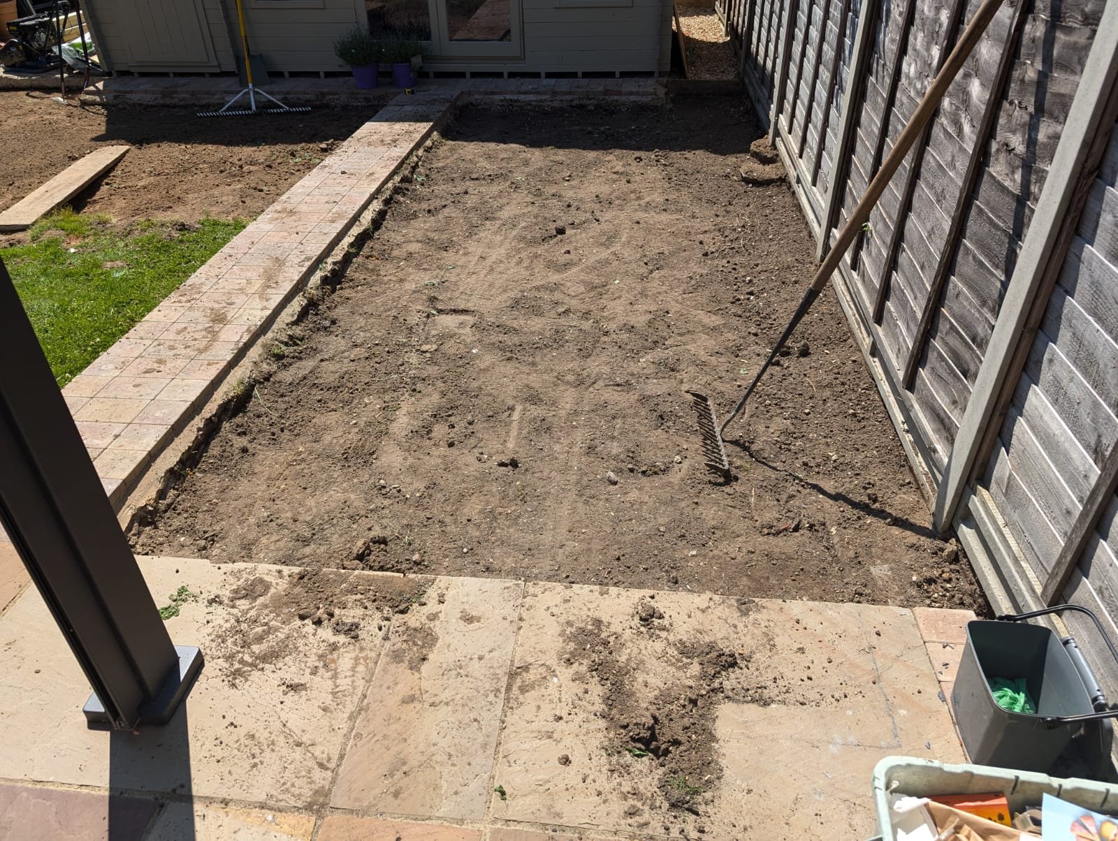 Excavation and levelling: The first section of grass has been thoroughly excavated and levelled, setting the stage for a fresh start.