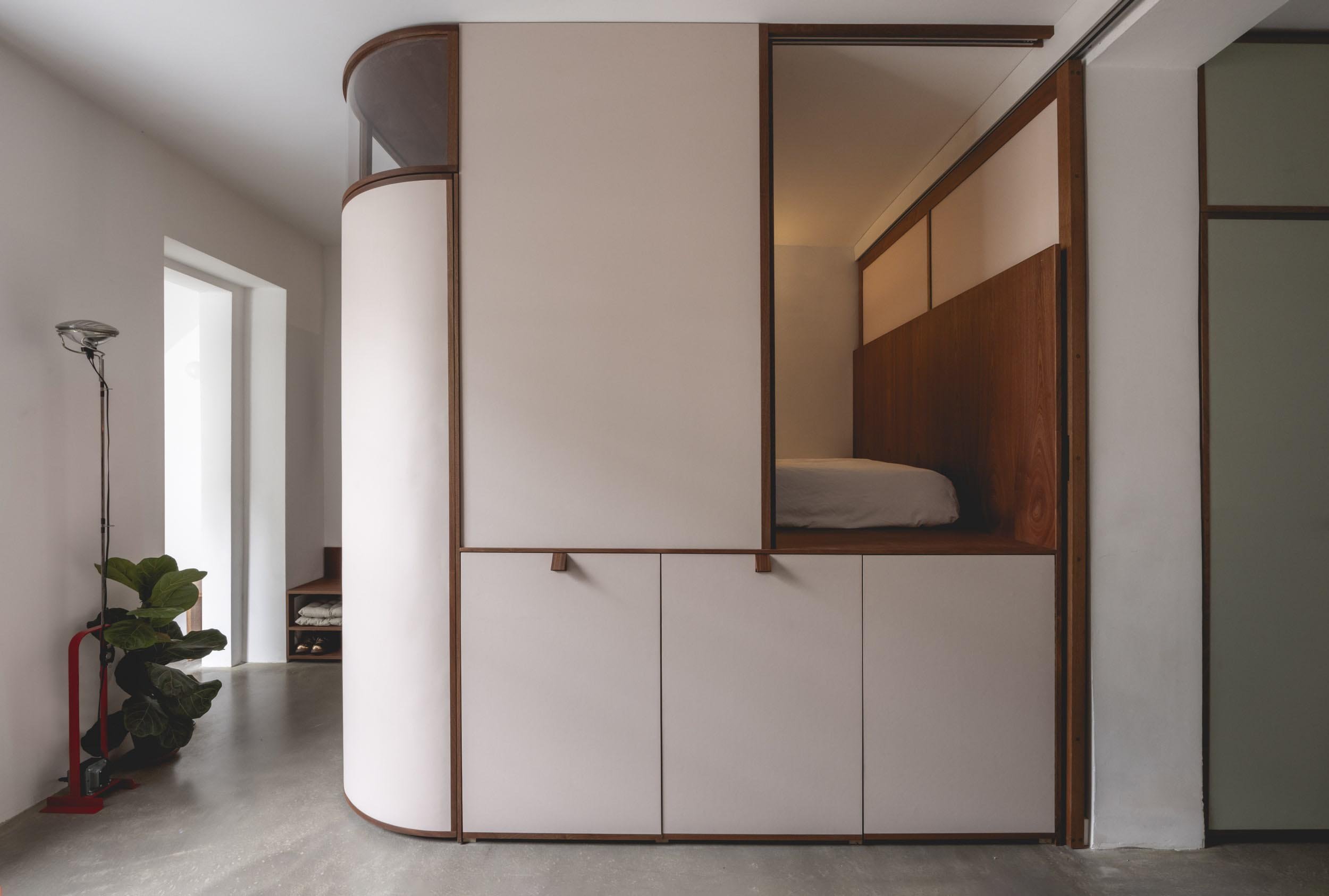 Sleeping pod in open plan apartment designed by Studiomama.