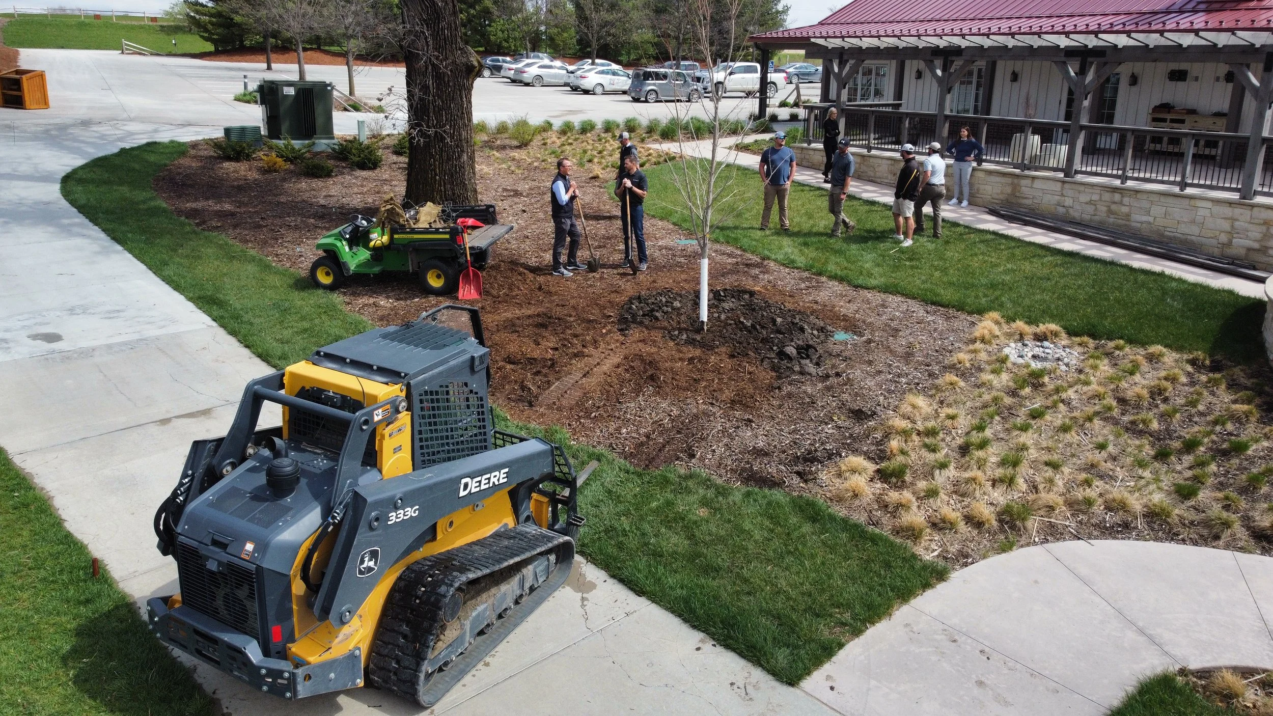 Brian Schenk pictured far left at an Arbor Day tree planting campaign in 2022 at Dormie Network’s ArborLinks Golf Club in Nebraska, City, NE 