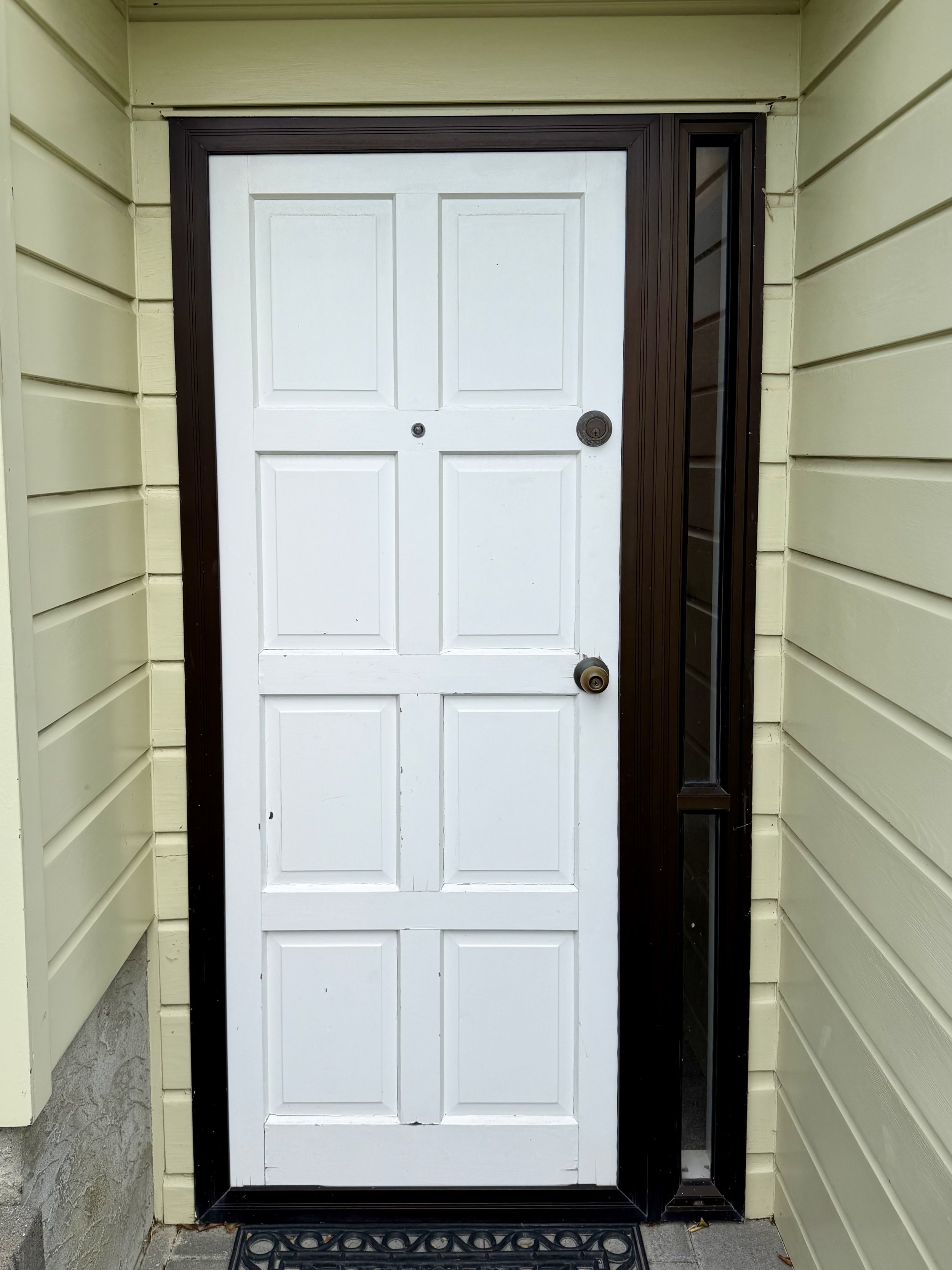 Old aluminium door to be removed and replaced with a new thermally broken aluminium door in Whitby.