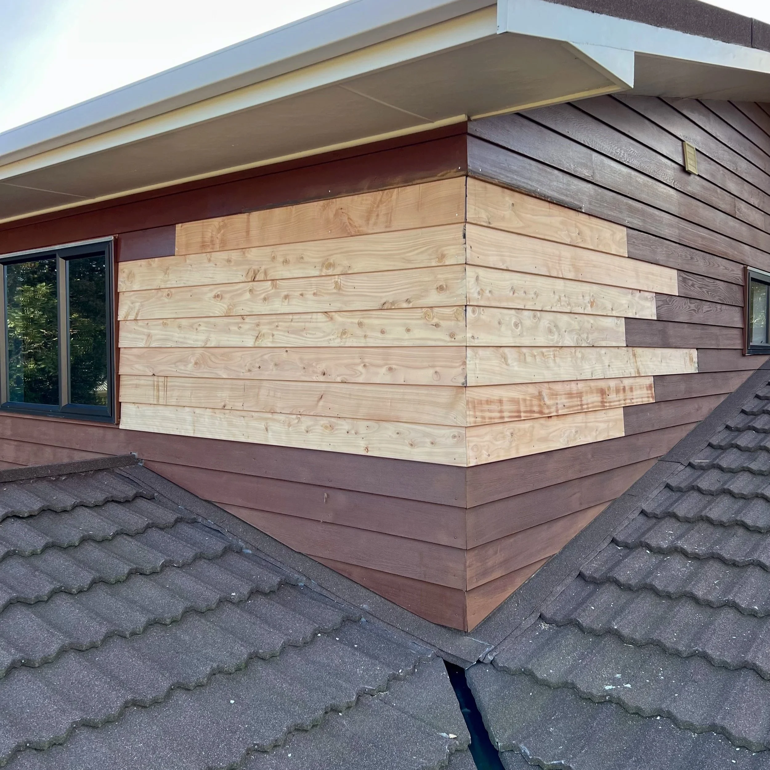 New timber weatherboard cladding where a window has been removed as part of a home renovation in Whitby.