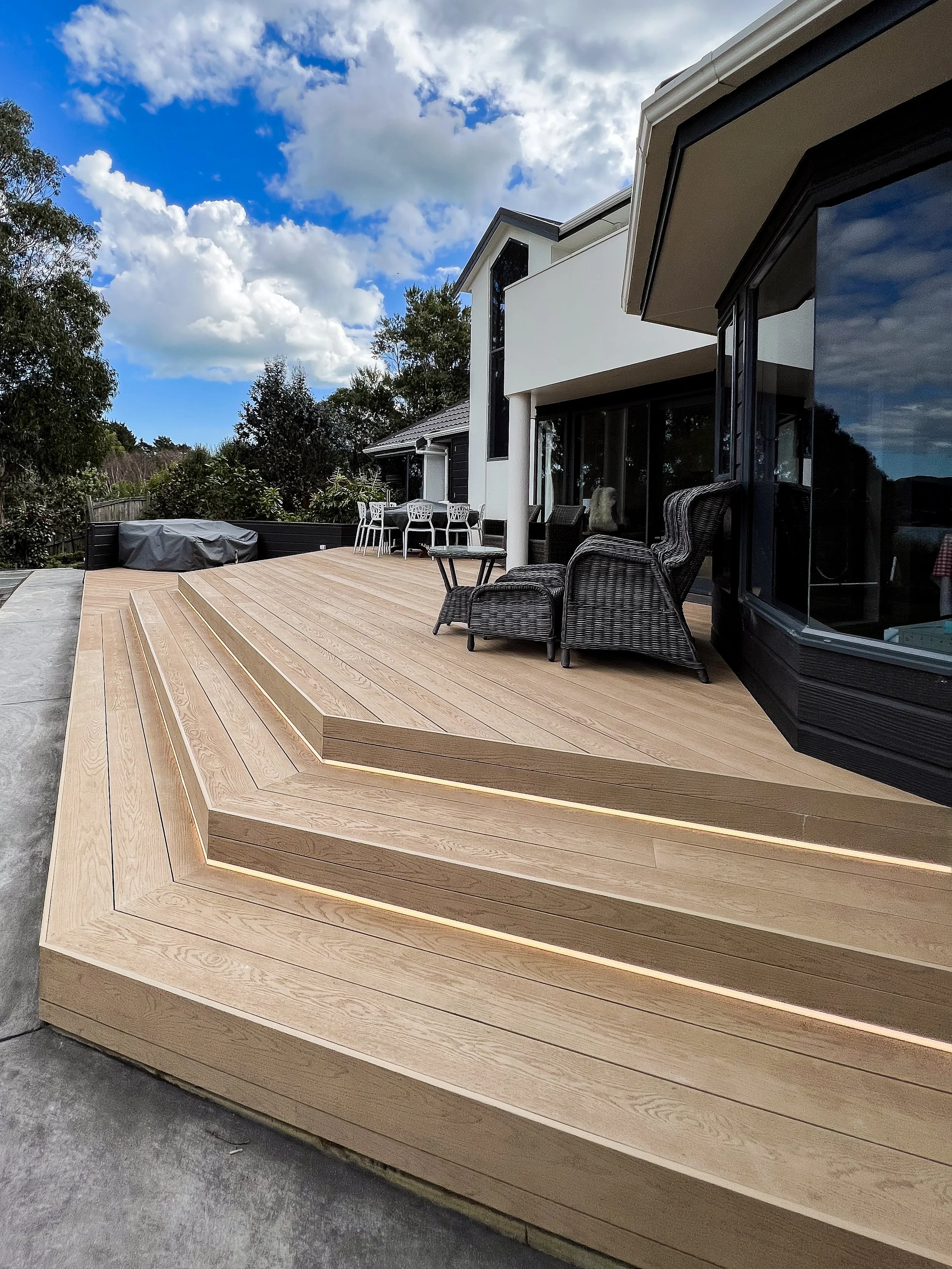 Millboard decking with LED strip lighting on the steps in Pauatahanui