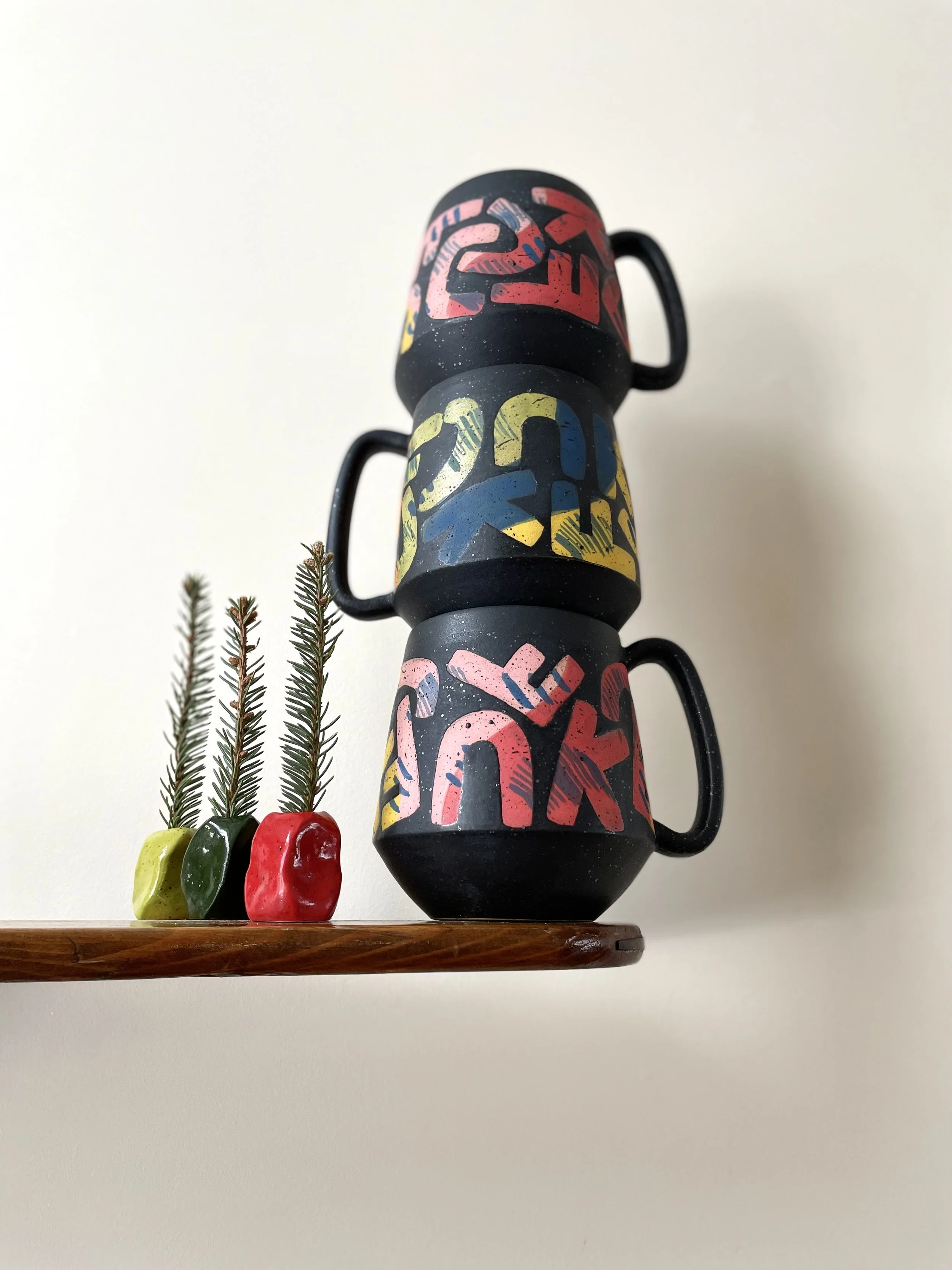 FCUK Mug with colour splatters letters, speckled matte black