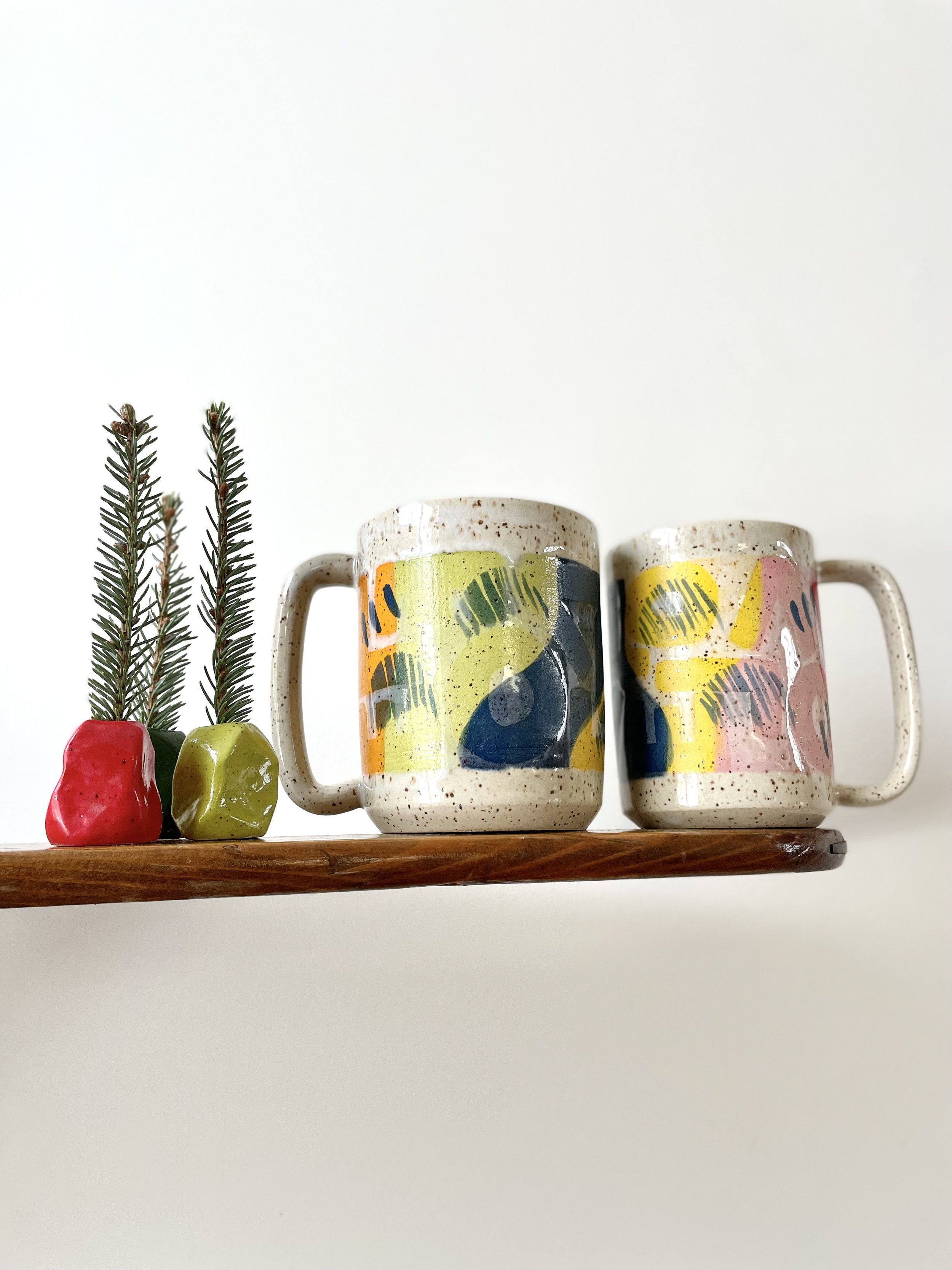 F-C-U-K Mug with colour splatter letters, speckled glossy white