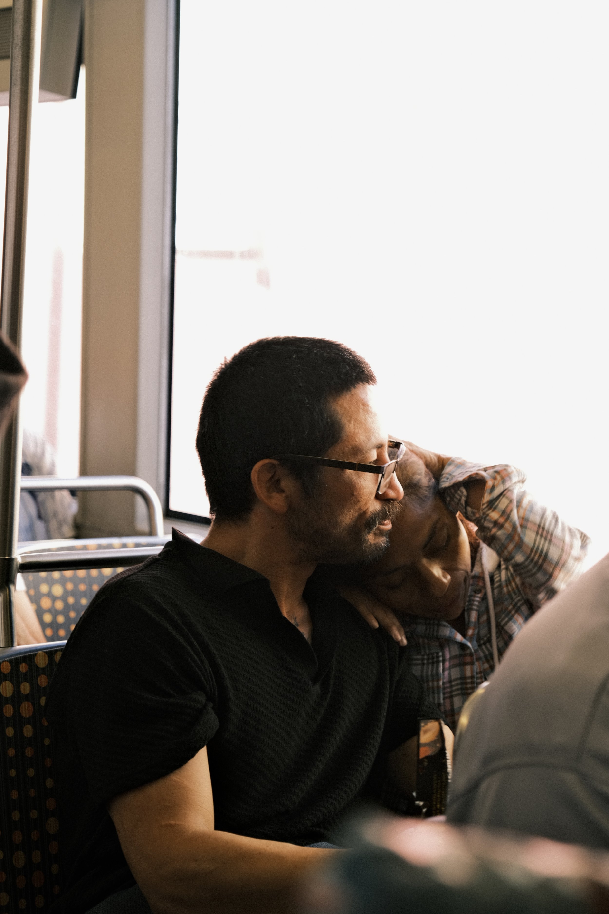 Riders on the E Line the morning of a Dodgers game.