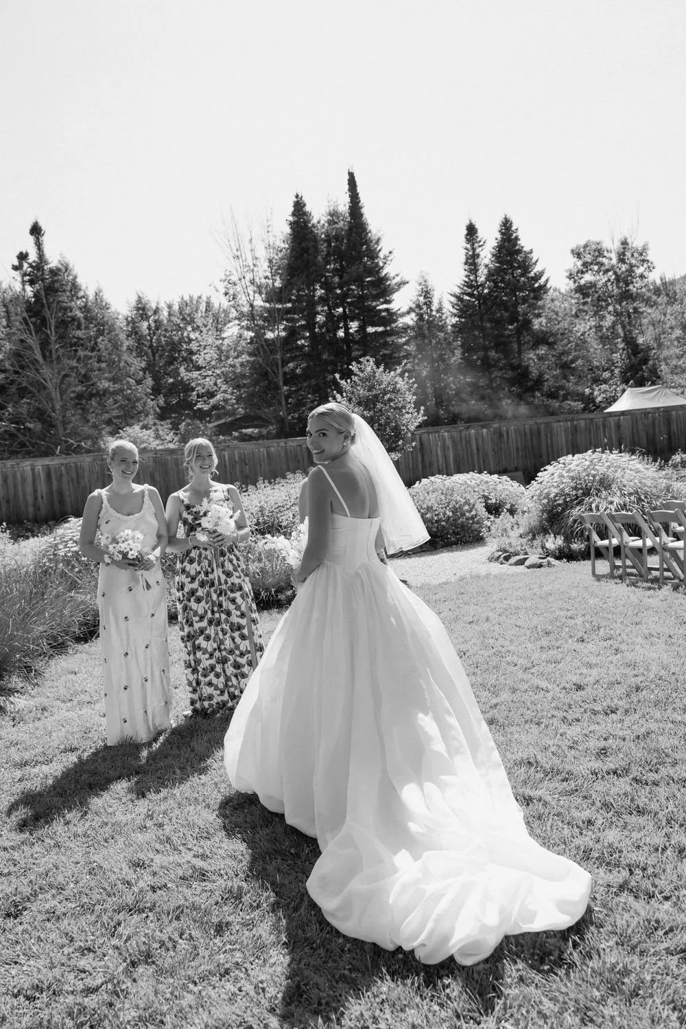Wedding florals at The Henson, Hensonville, NY — gardeny red, creams, and greens with seasonal produce by Fiora floral design, Hudson Valley wedding florist.