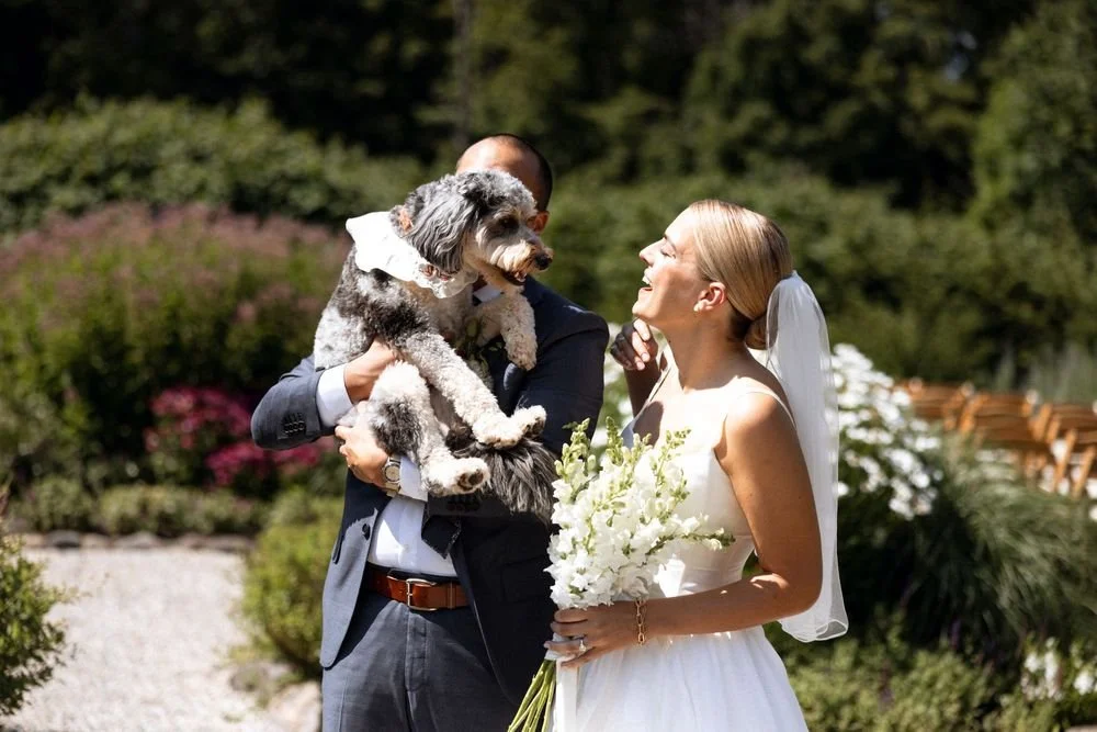 Wedding florals at The Henson, Hensonville, NY — gardeny red, creams, and greens with seasonal produce by Fiora floral design, Hudson Valley wedding florist.