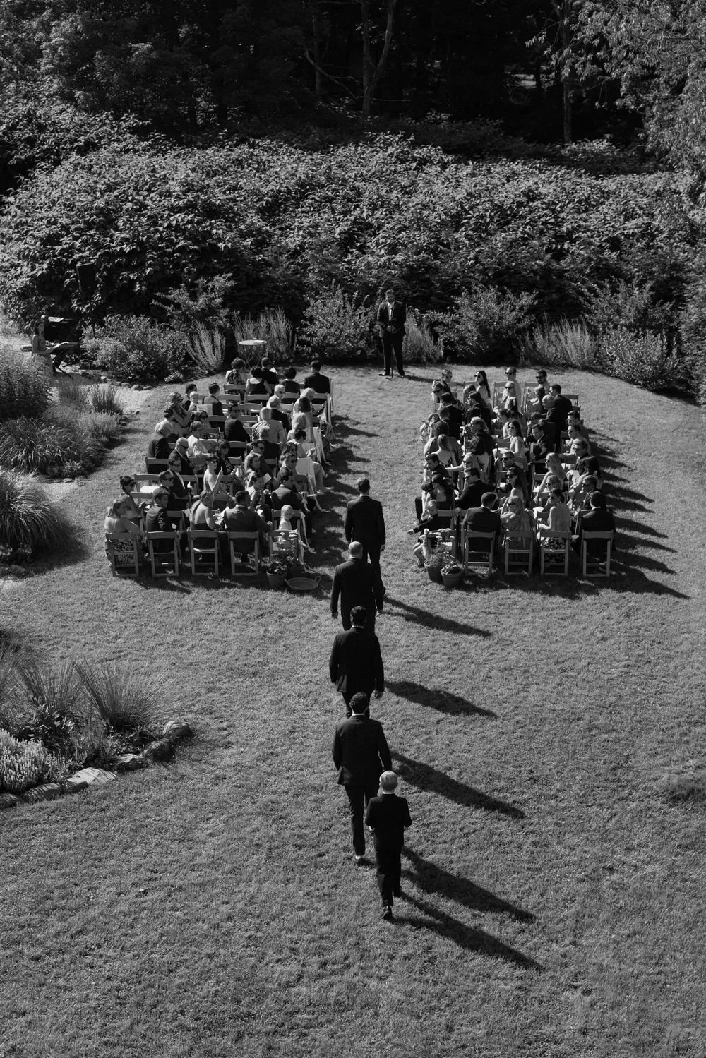Wedding florals at The Henson, Hensonville, NY — gardeny red, creams, and greens with seasonal produce by Fiora floral design, Hudson Valley wedding florist.