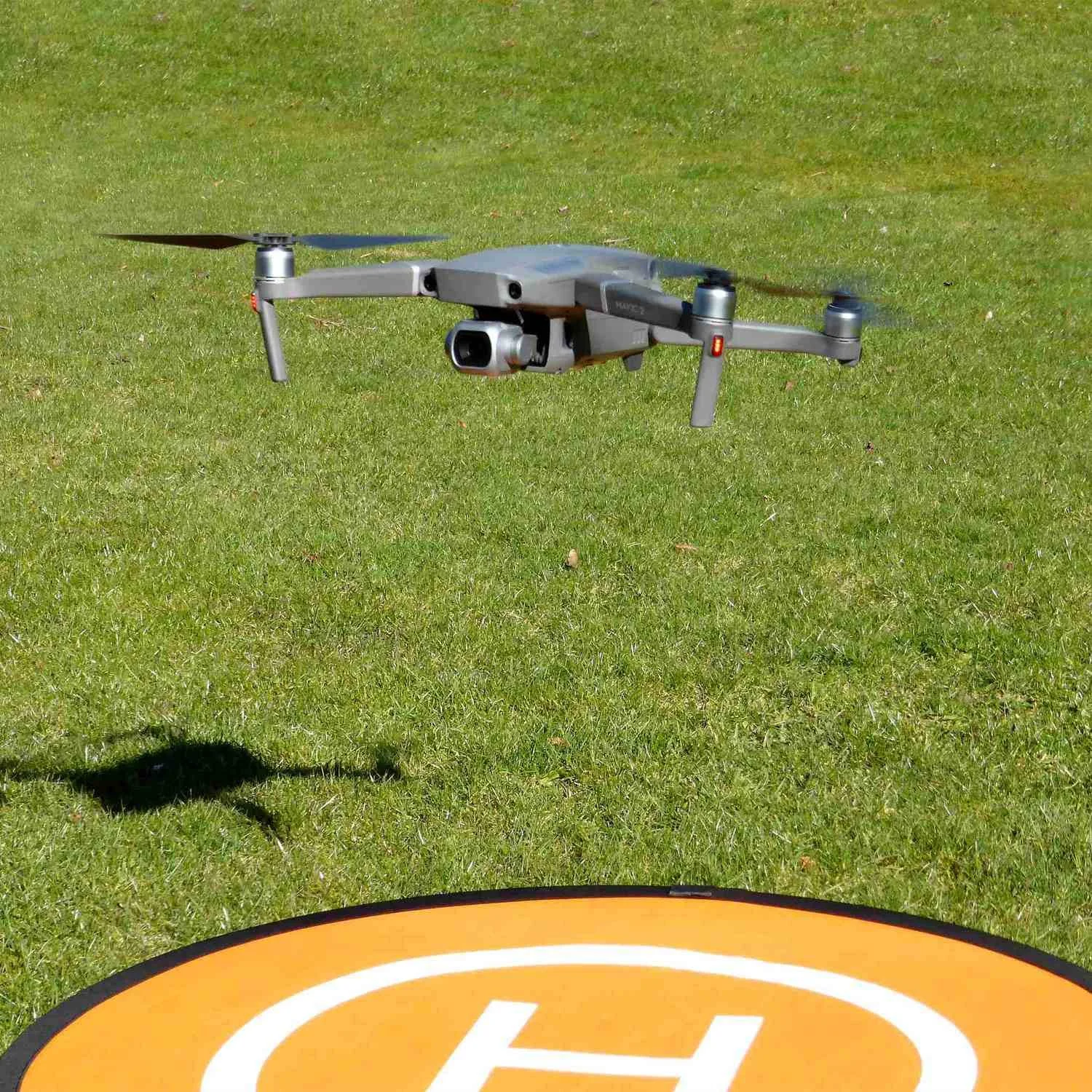 drone taking off from landing pad