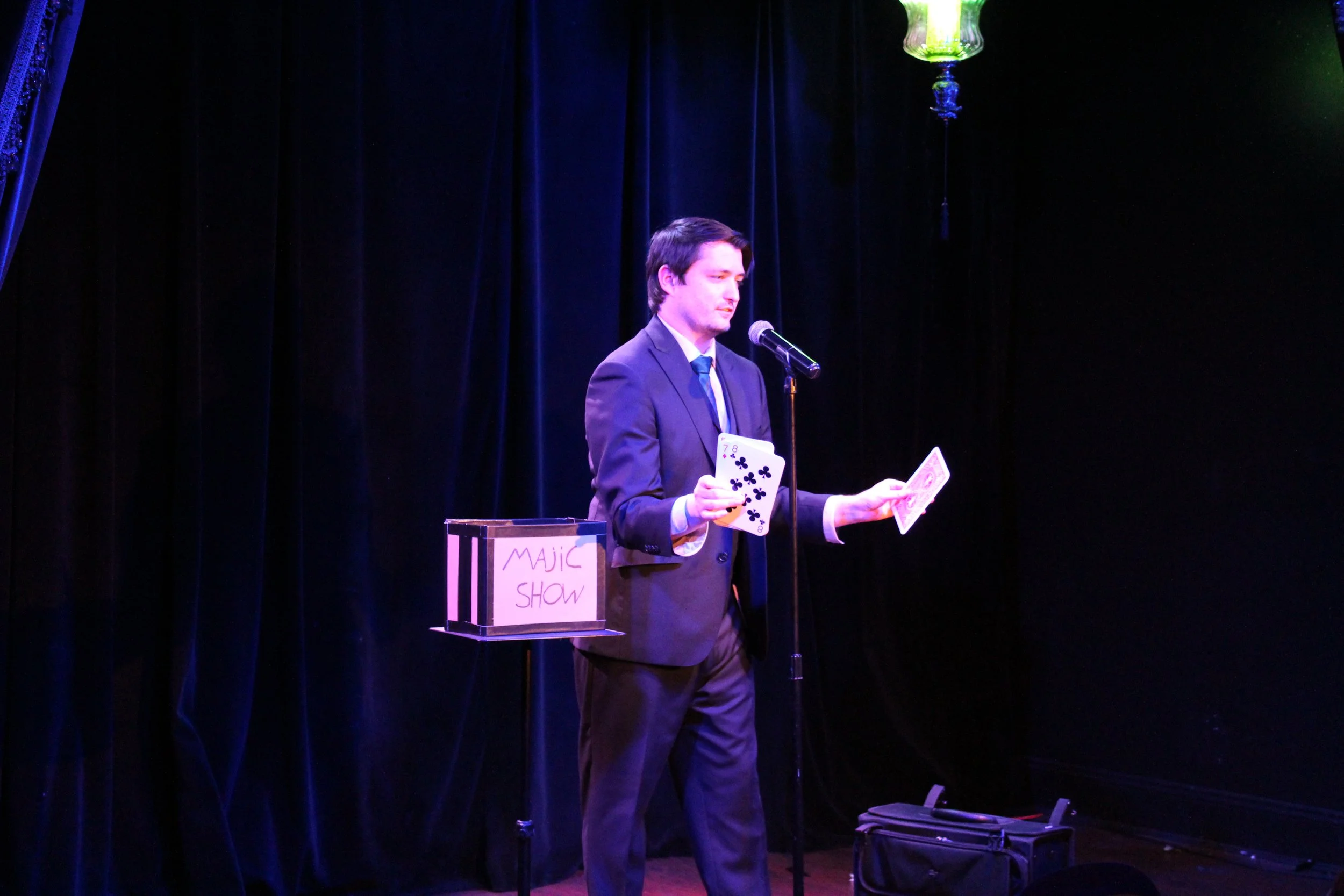 Corporate keynote magician Josh Weidner engaging a conference audience during a talk