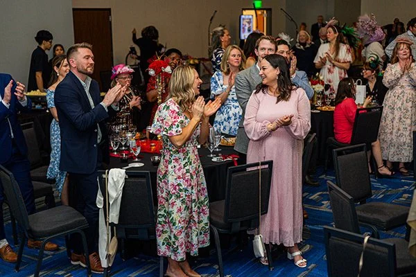 Josh Weidner receiving a standing ovation after his comedy magic show