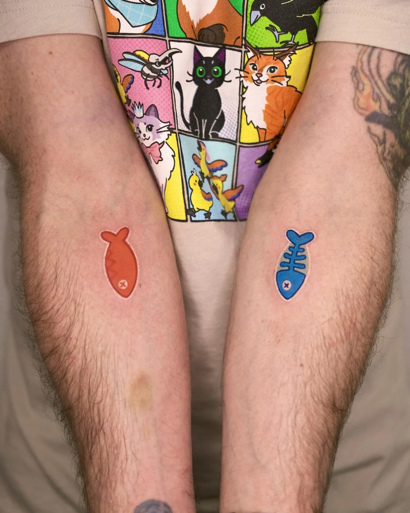 @littlekittybigcitygame fish tats for @matt.t.wood who made the game!! 🐟&hearts;️

i've had the privilege of contributing some art to the game and its merch here and there. thank you matt for having me do these special tattoos for you 🥰 

ᯓ★

licen