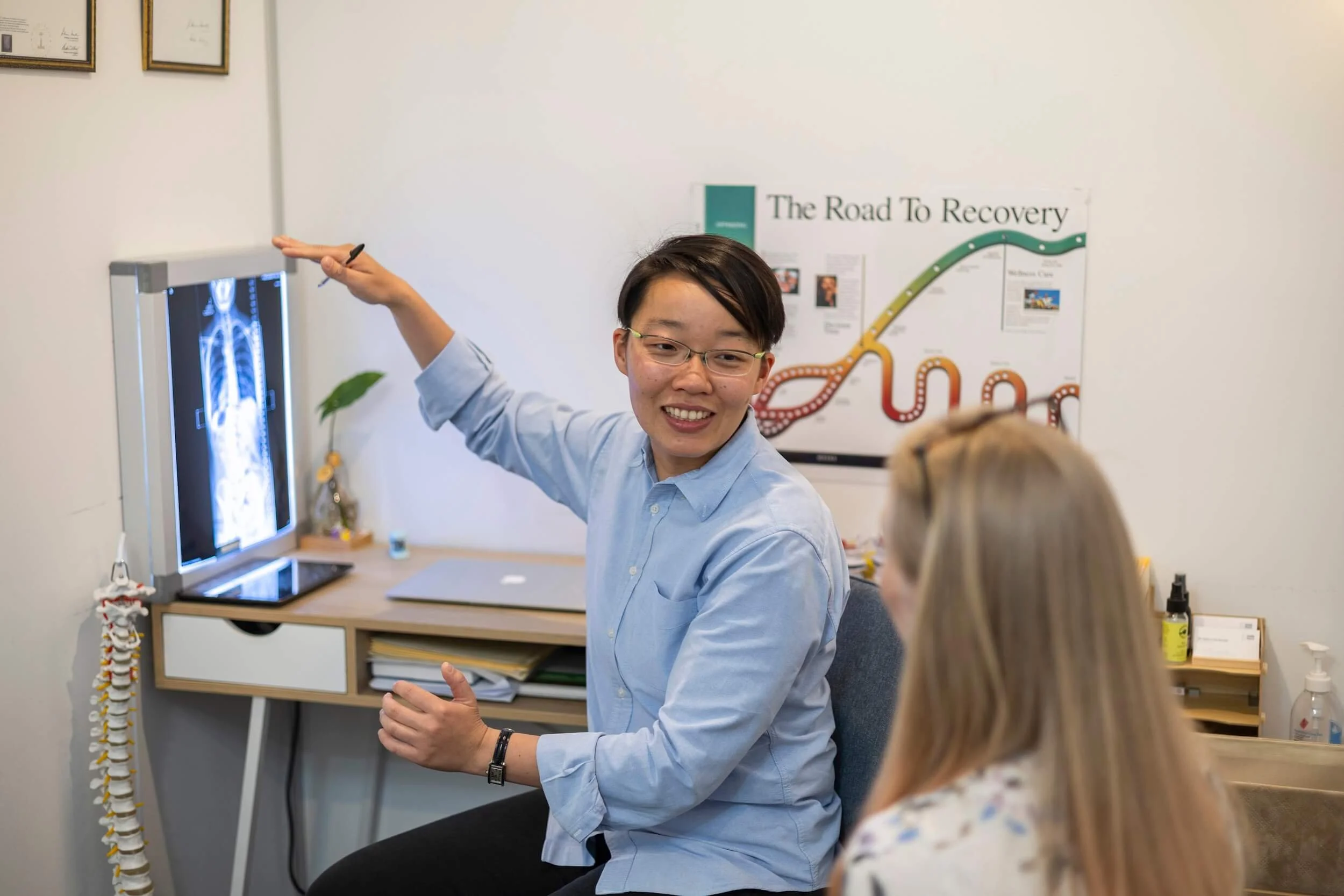 Explaining our X-ray findings during a chiropractic consultation