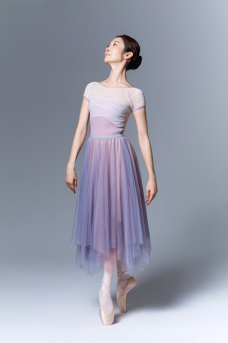 Full-length ballet portrait of Julie in a lavender dress.