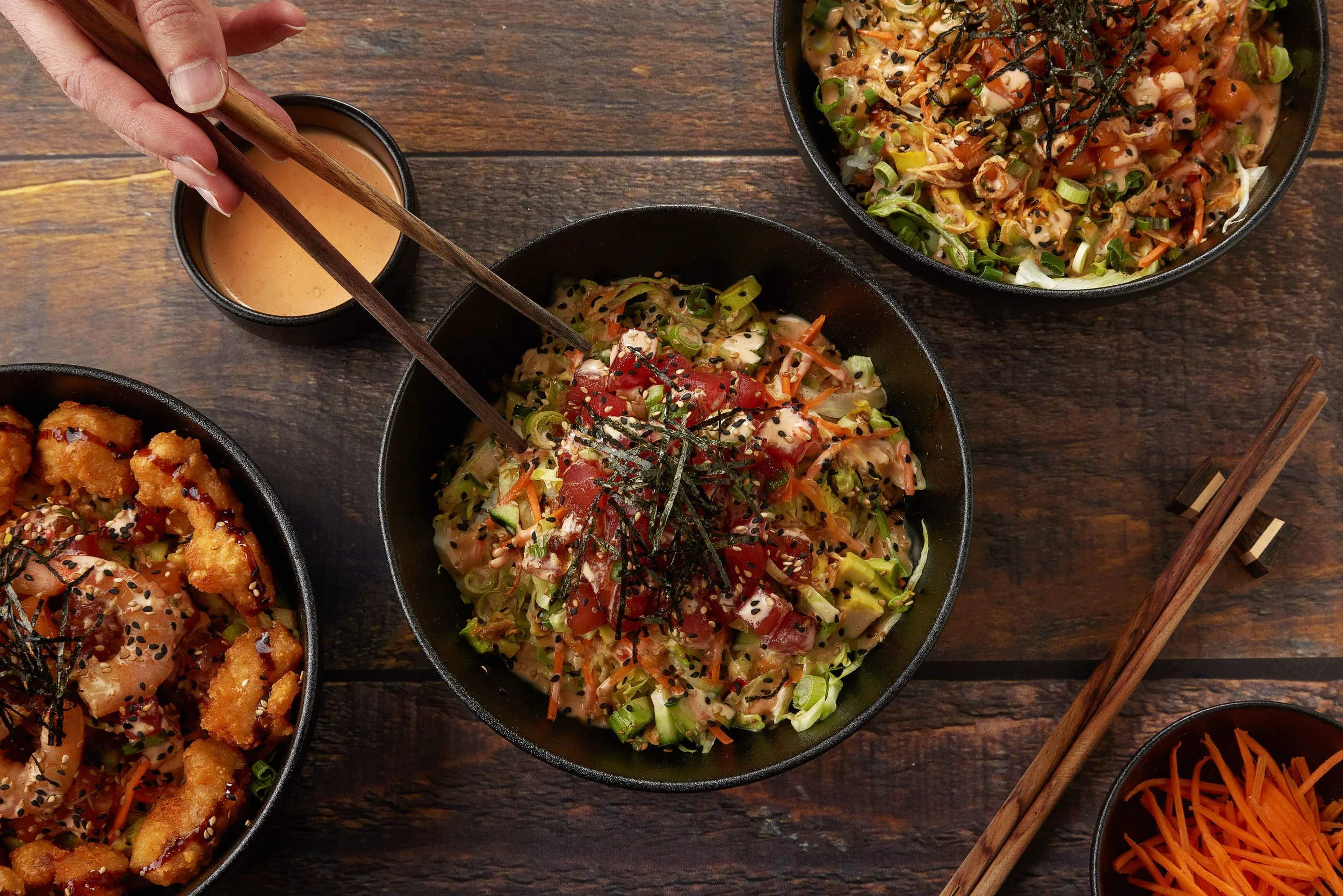Poké bowls on a table.