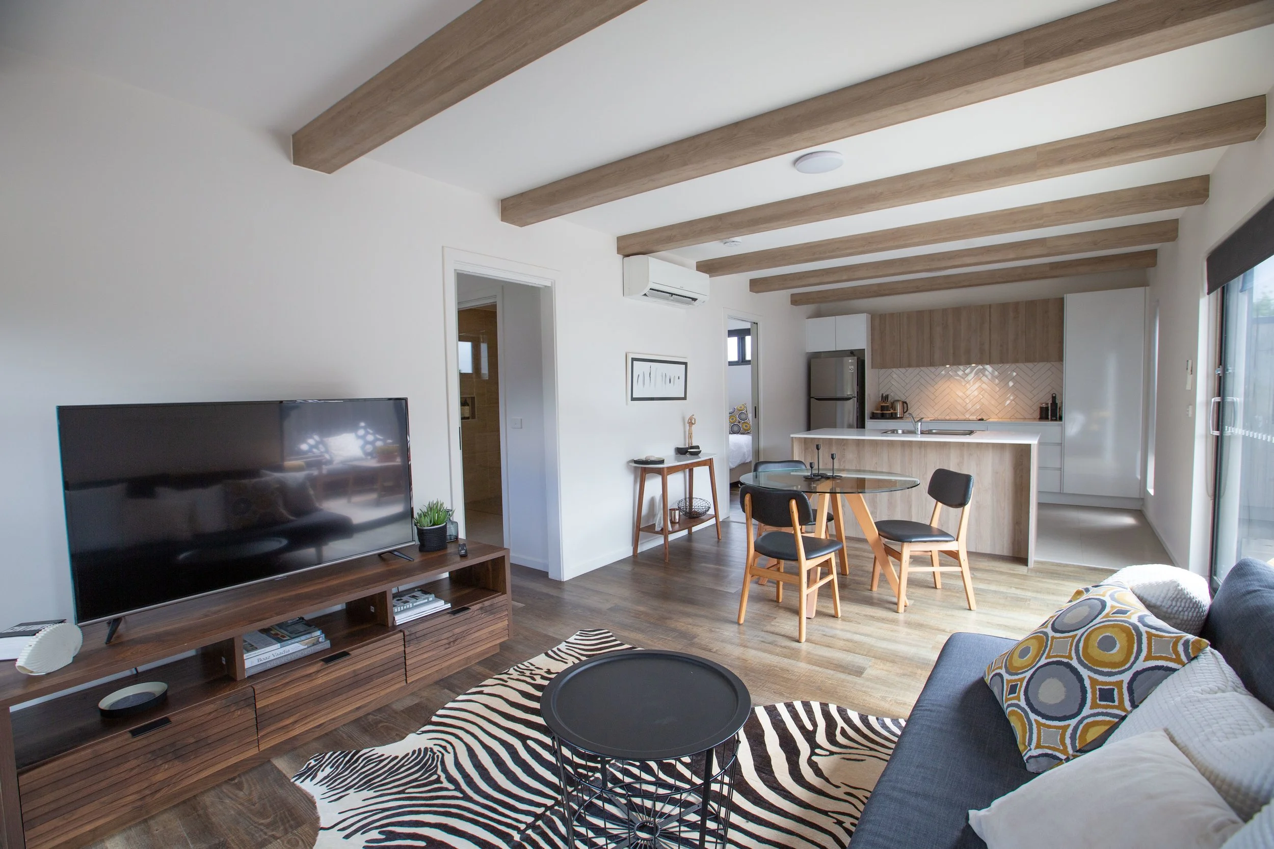 Eighty Seven on Byrnes - Apartment No.3 "Sunsets" Coastal Accommodation - Living/Dining/Kitchen