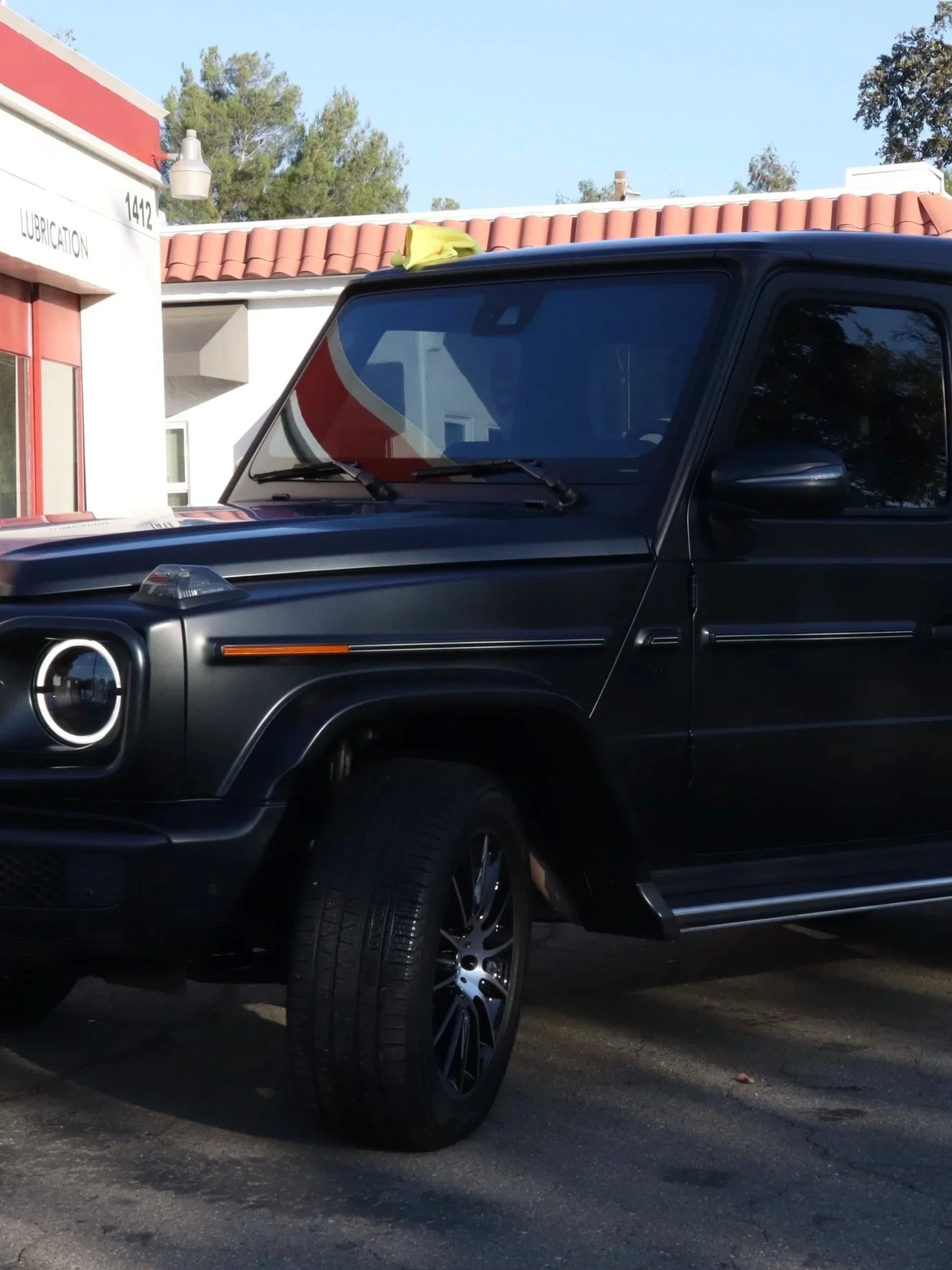 Mercedes G-Class receiving paint protection film in showroom / clear satin / matte PPF to protect the body of the car in Walnut Creek CA, Livermore CA