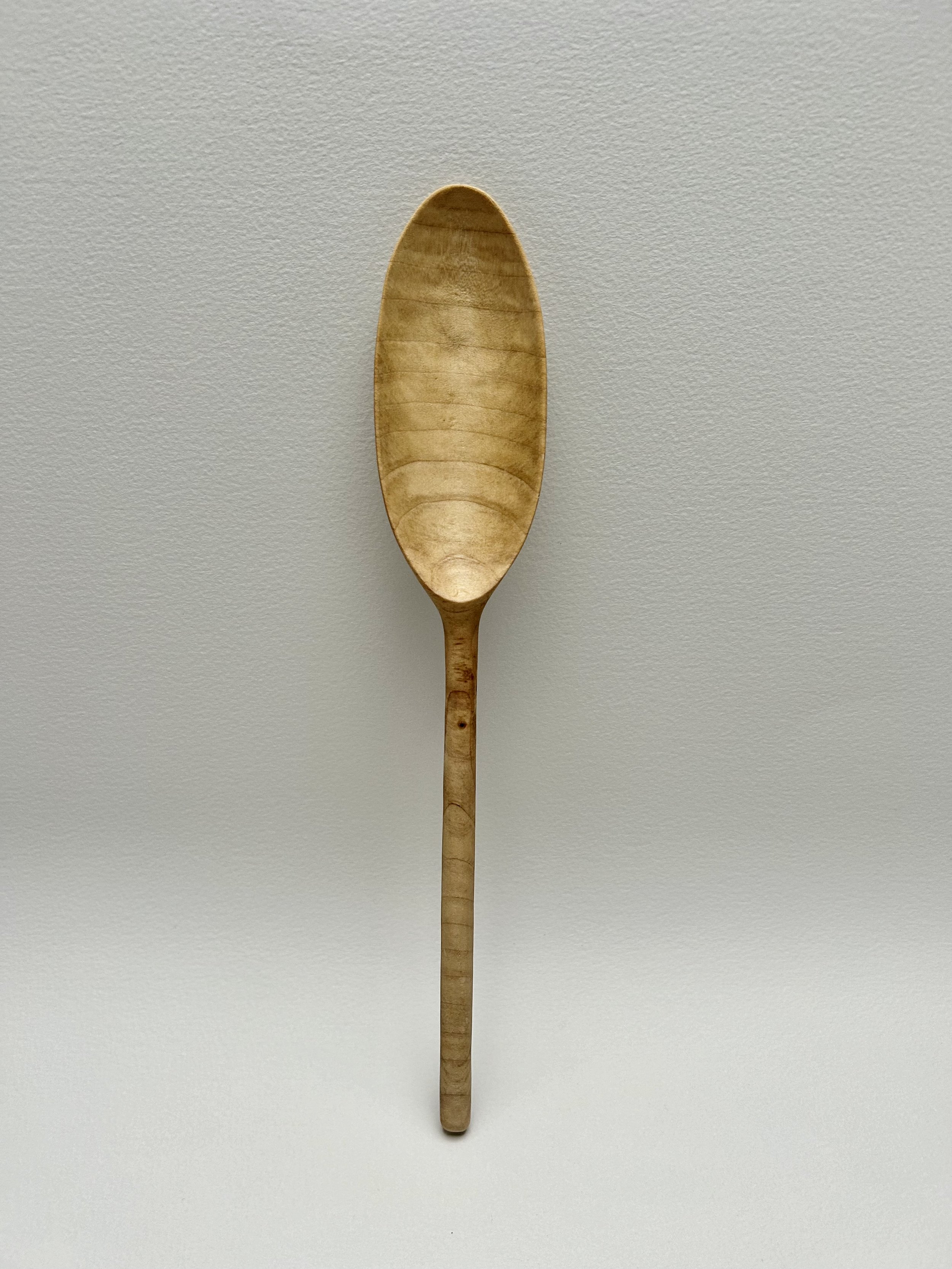 kate-birss-tulip-wood-oval-bowl-spoon-1.jpeg