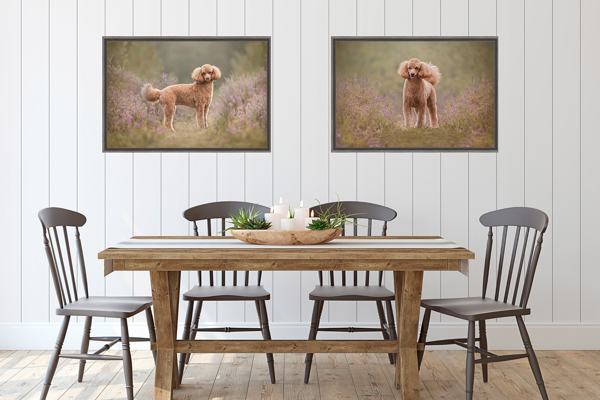 Dining room with wooden table and chairs, two framed dog photos on the wall, and a centerpiece with candles and plants- west sussex