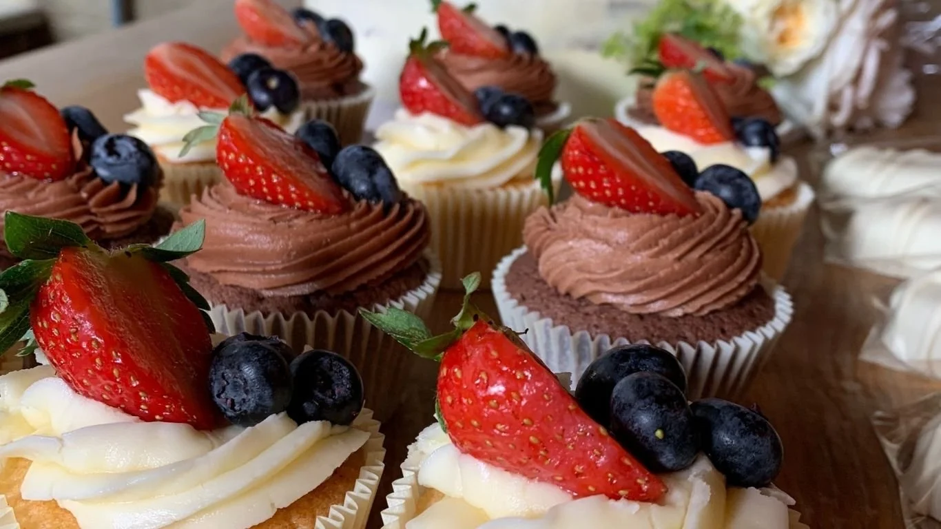 Cupcakes decorated with fresh berries