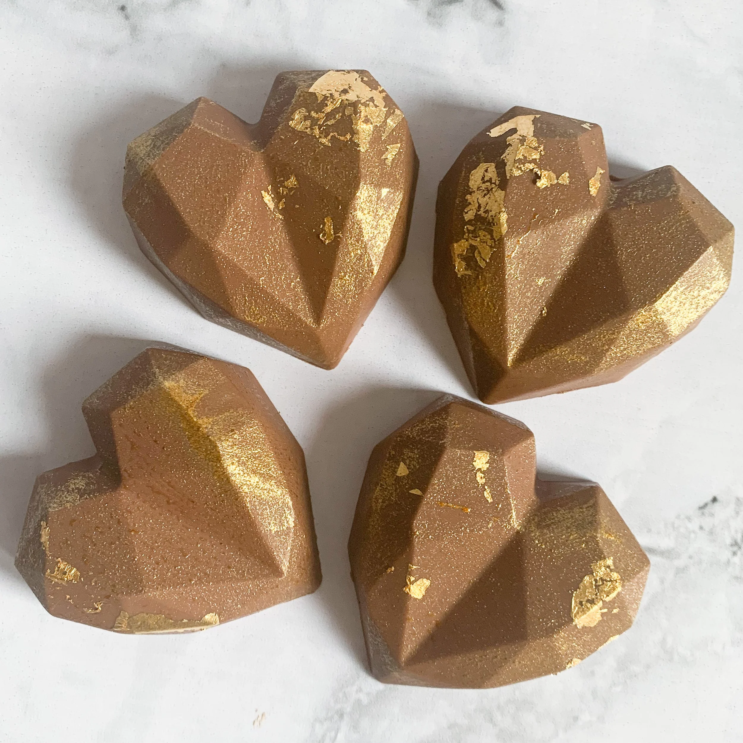 Chocolate geometric hearts with gold leaf detail