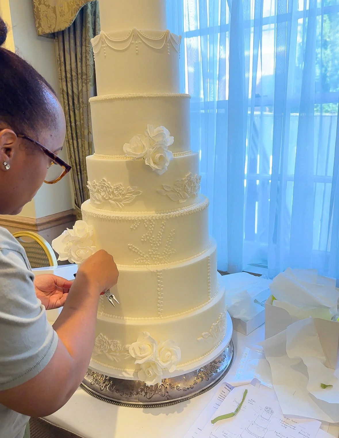 Eight-tier white wedding cake with vintage piping and sugar flowers at The Compleat Angler in Marlow