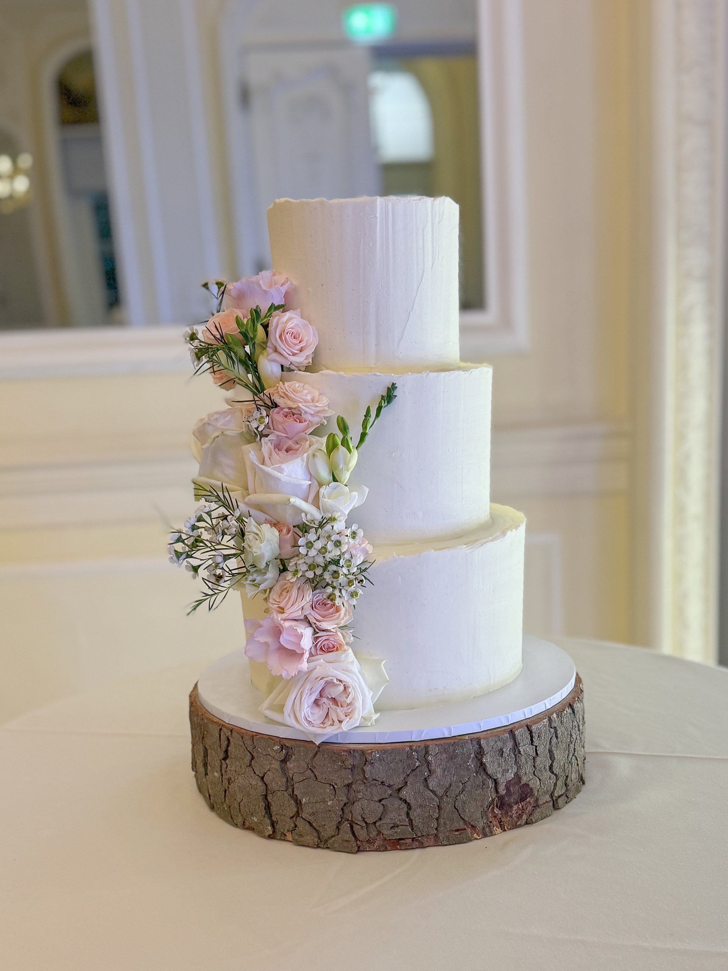 3 Tier Ganache and cascading fresh flowers