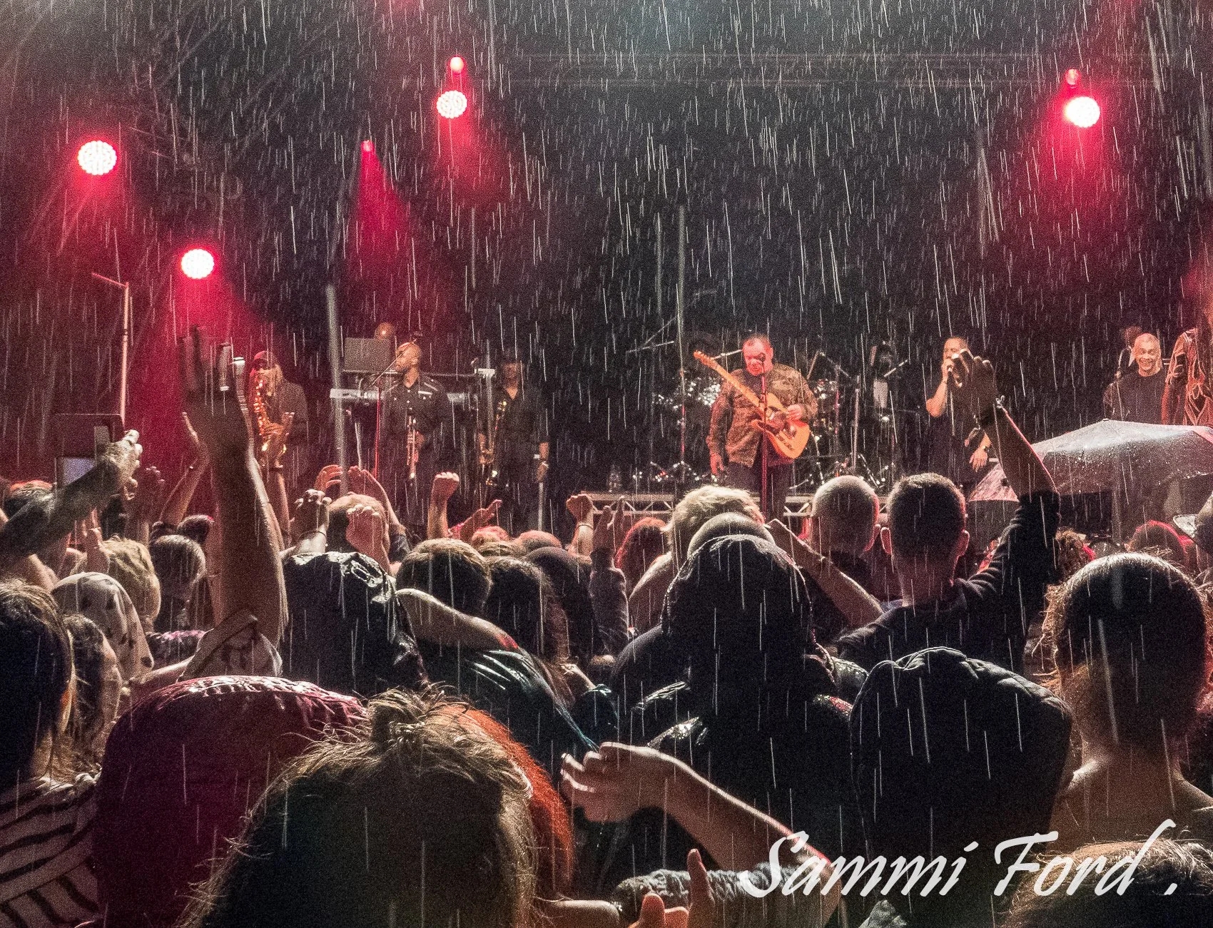 UB40 singing in the rain at Lincoln Castle SFo.jpg