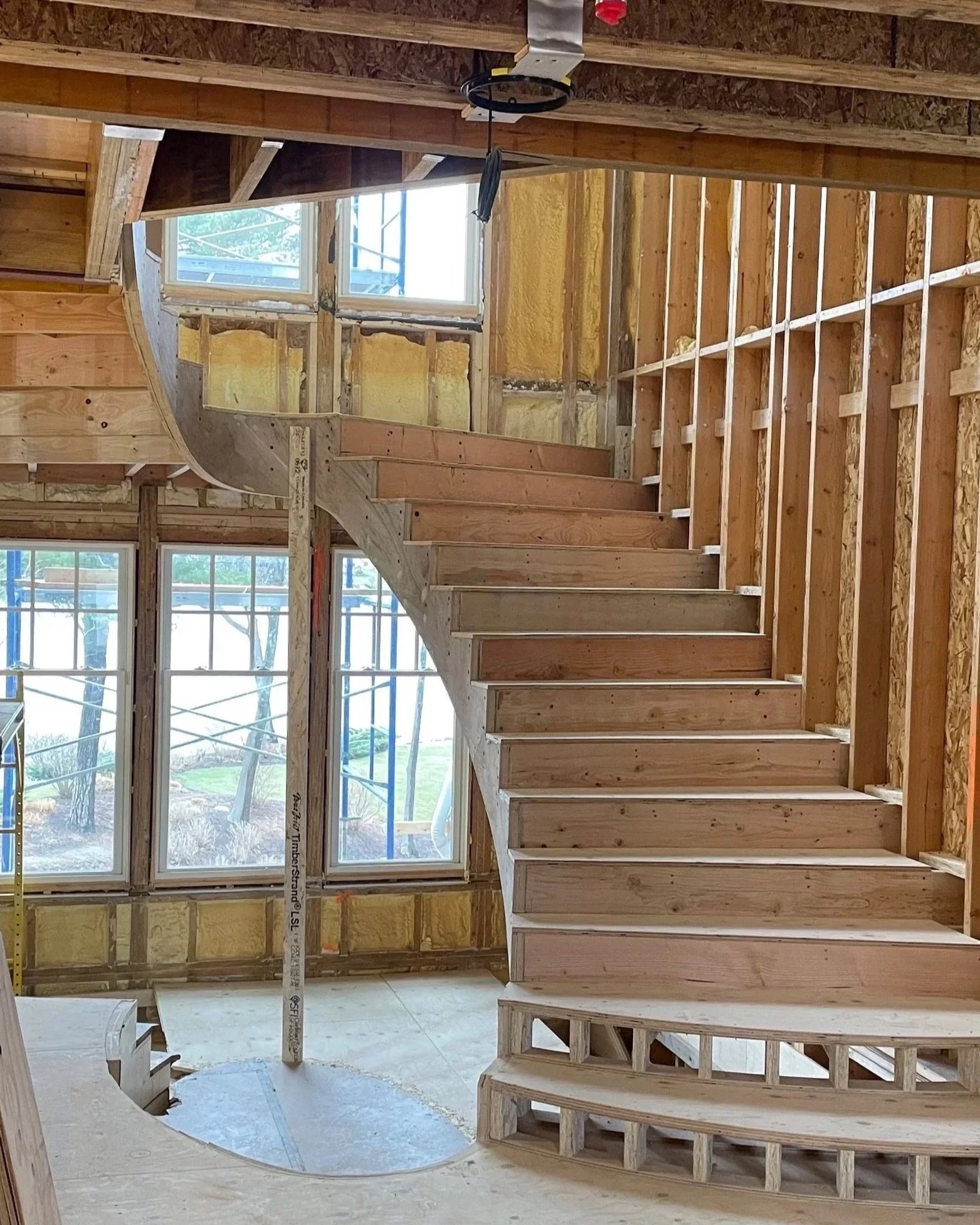 Custom Built Spiral Staircase by Dan Goraj Grand Coast Contractors of Grand Haven Michigan