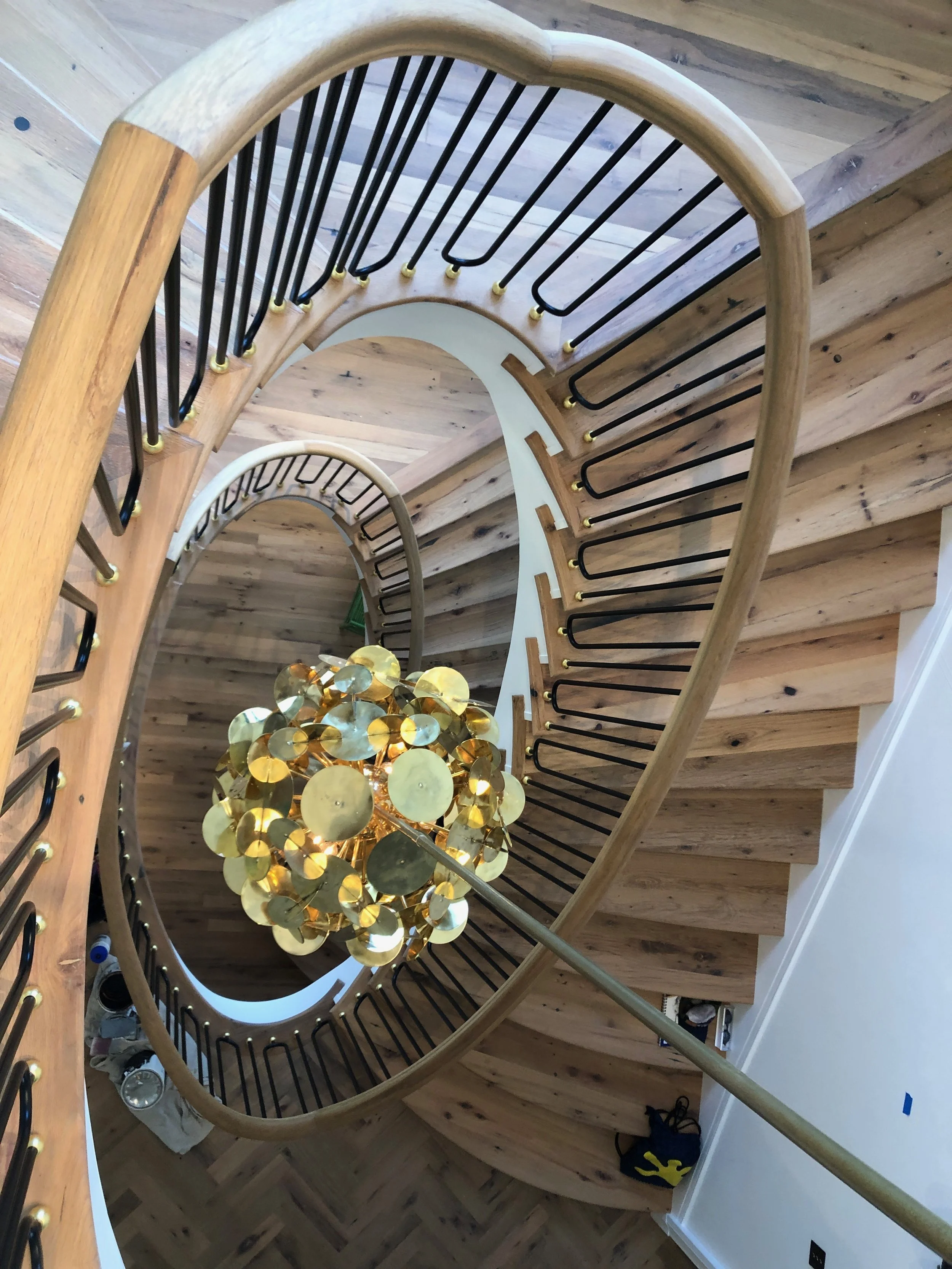 Custom Built Spiral Staircase by Dan Goraj Grand Coast Contractors of Grand Haven Michigan