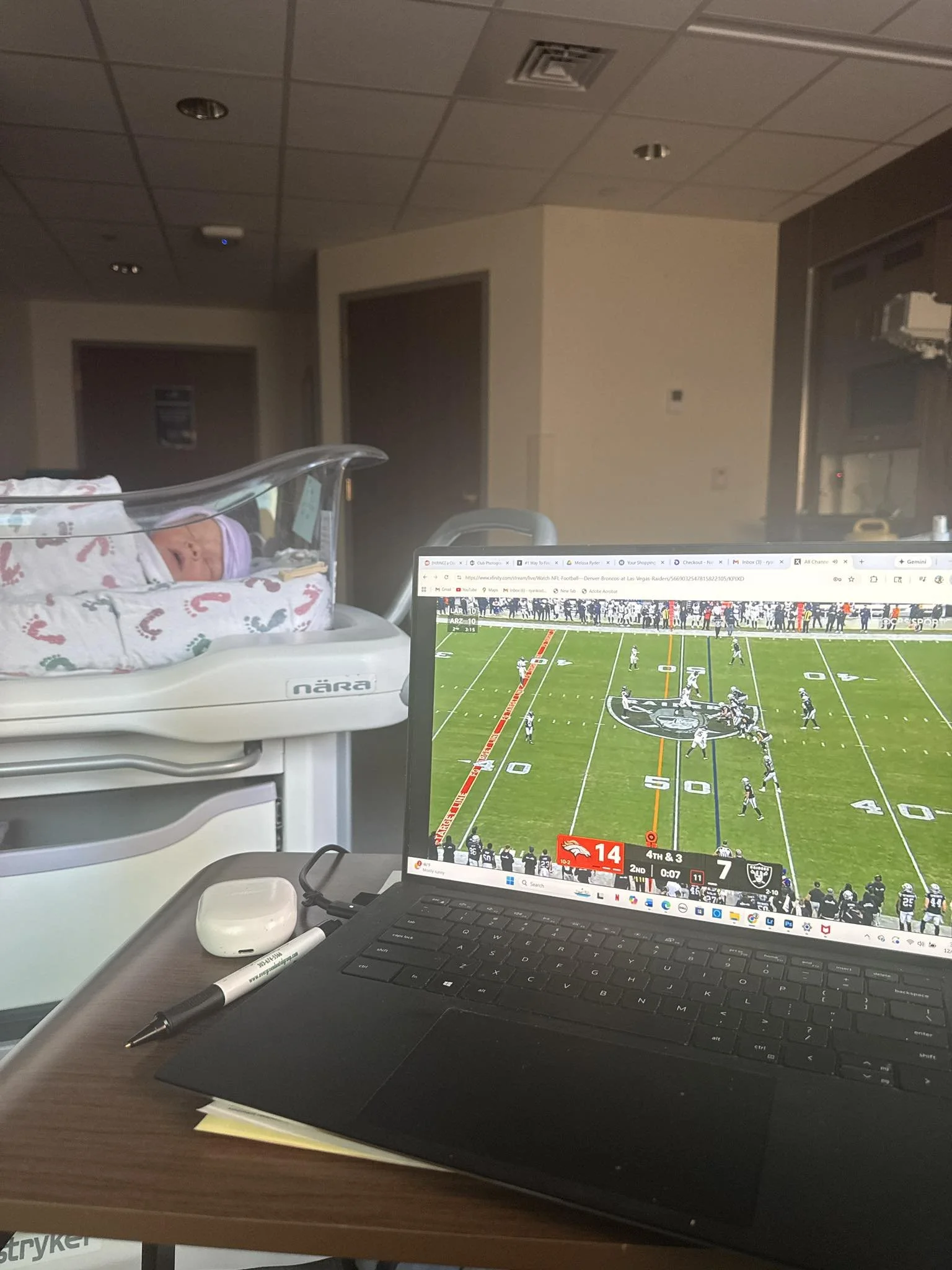Newborn-Portrait-Watching-Denver-Broncos-Game-with-Dad.jpg