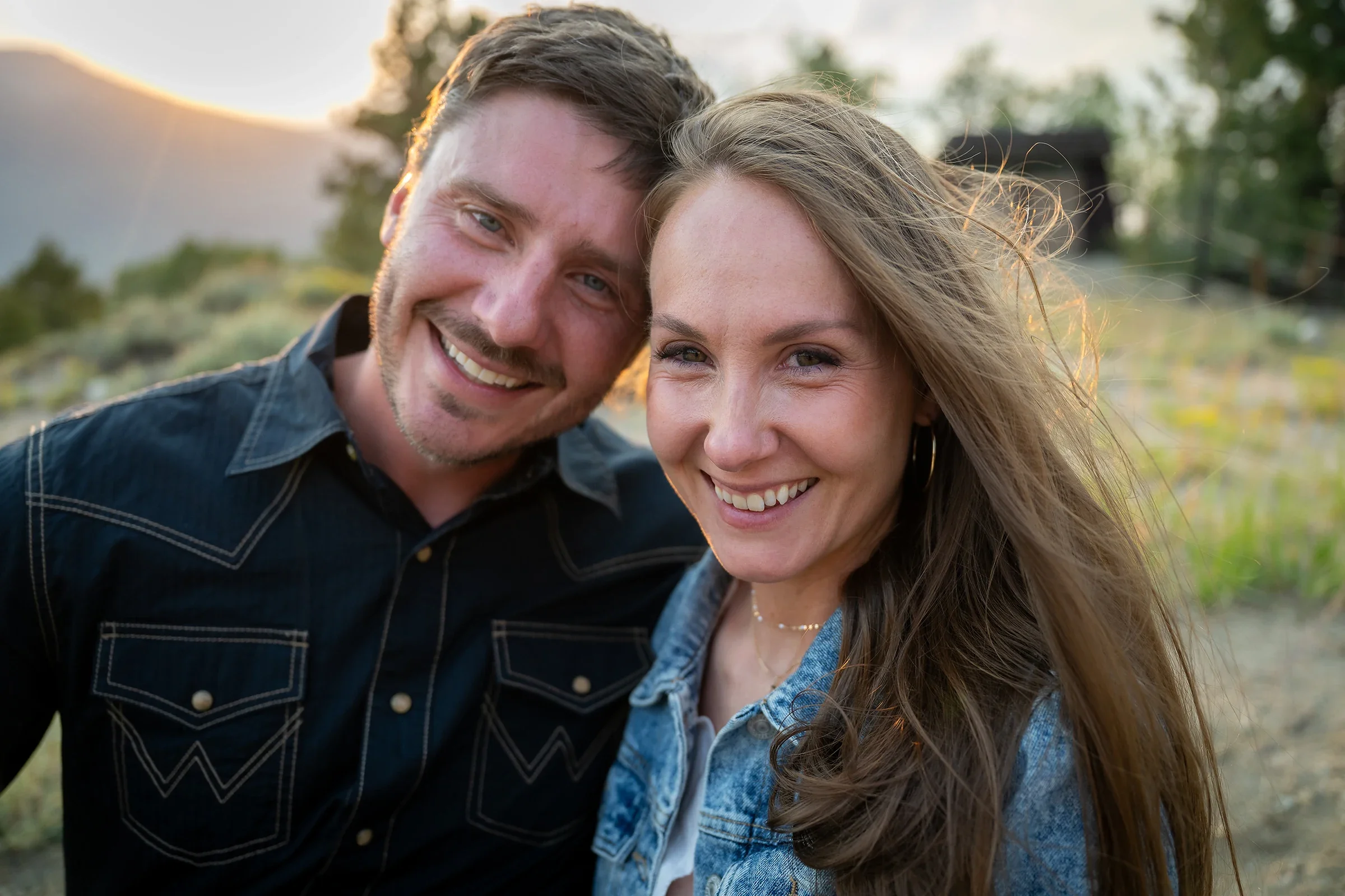 Candid portrait of smiling newlyweds celebrating their intimate Twin Lakes, Colorado elopement.