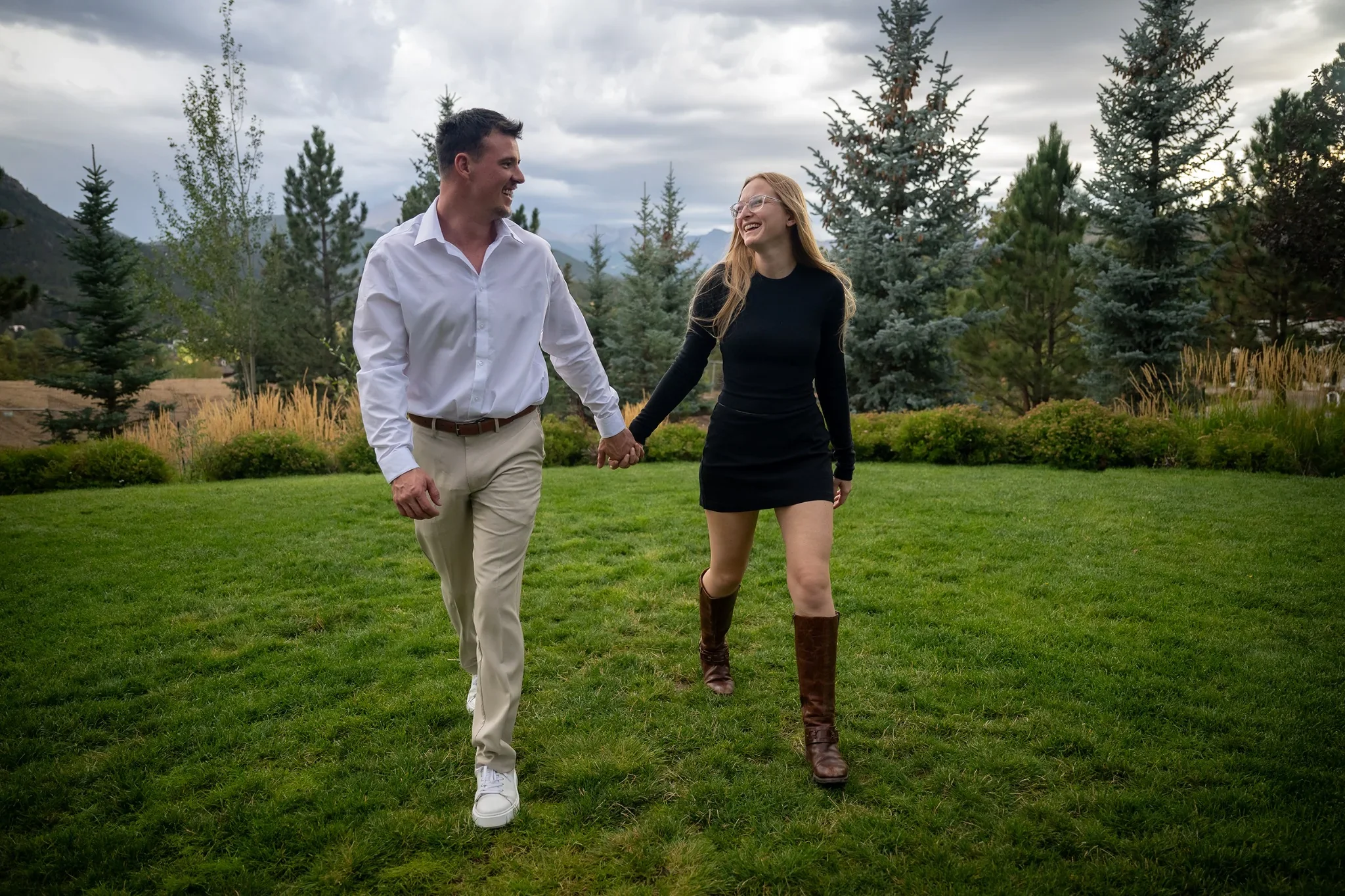 Engaged couple walking together at the Stanley Hotel in Estes Park, Colorado