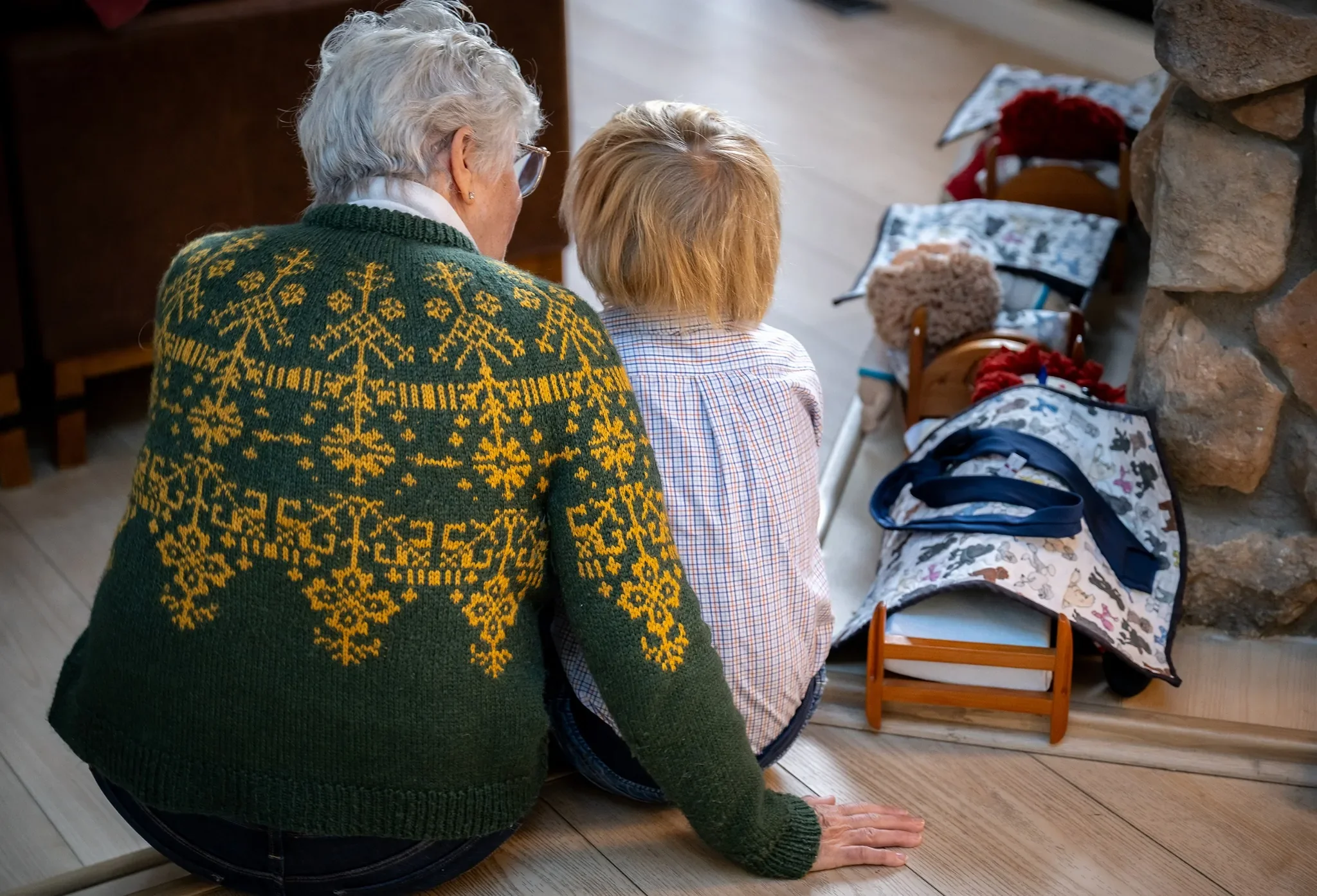 Grandmother and grandson documentary portrait sitting together at home in Indian Hills, Colorado captured by Ryan Kost.