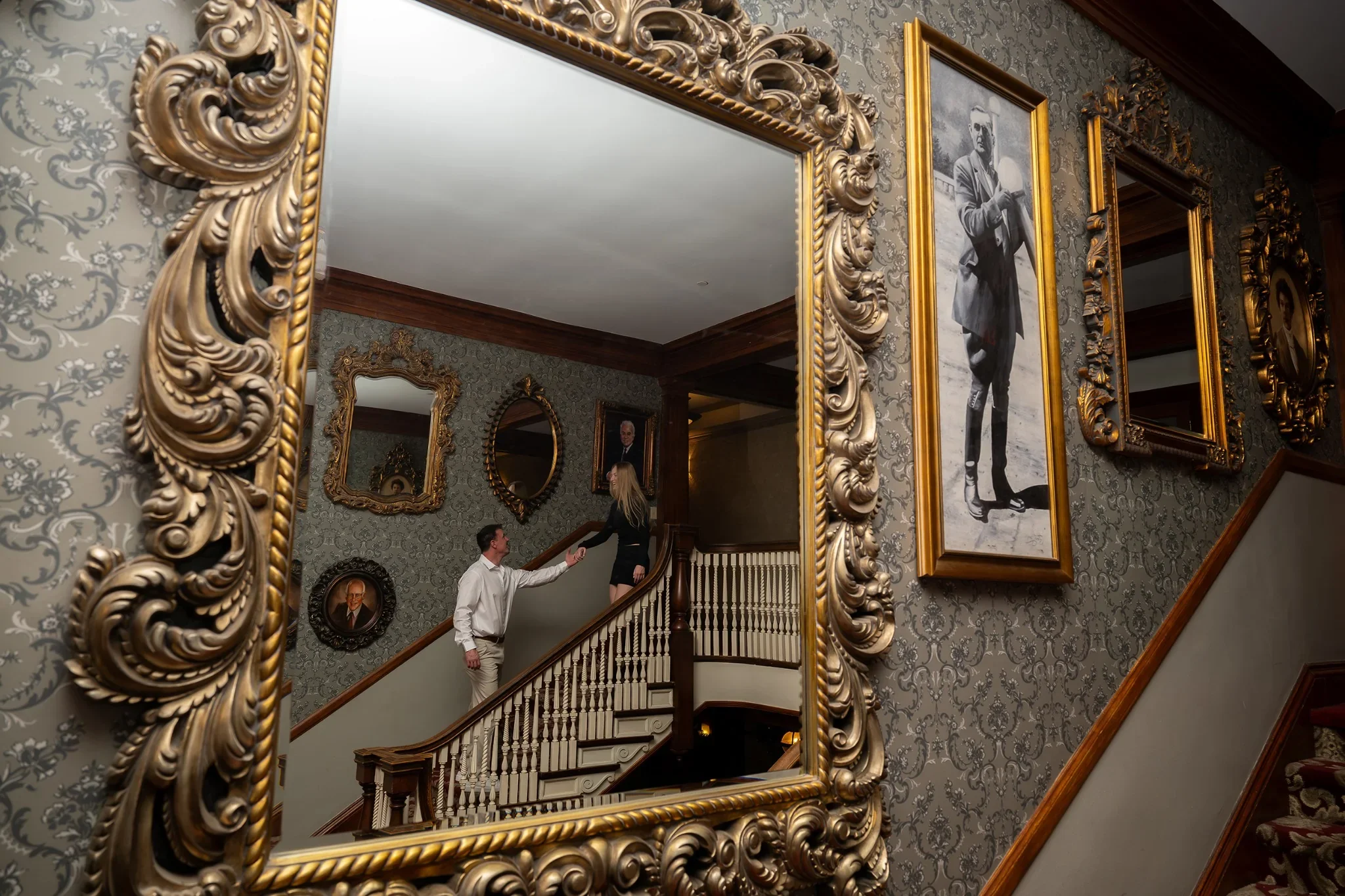 Creative mirror portrait during a Stanley Hotel engagement photography session in Estes Park