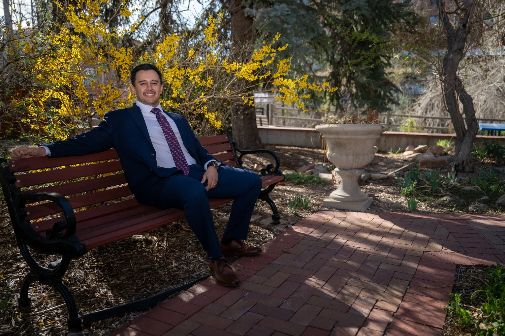 Relaxed, outdoor spring professional business headshot photography in downtown Golden, Colorado.
